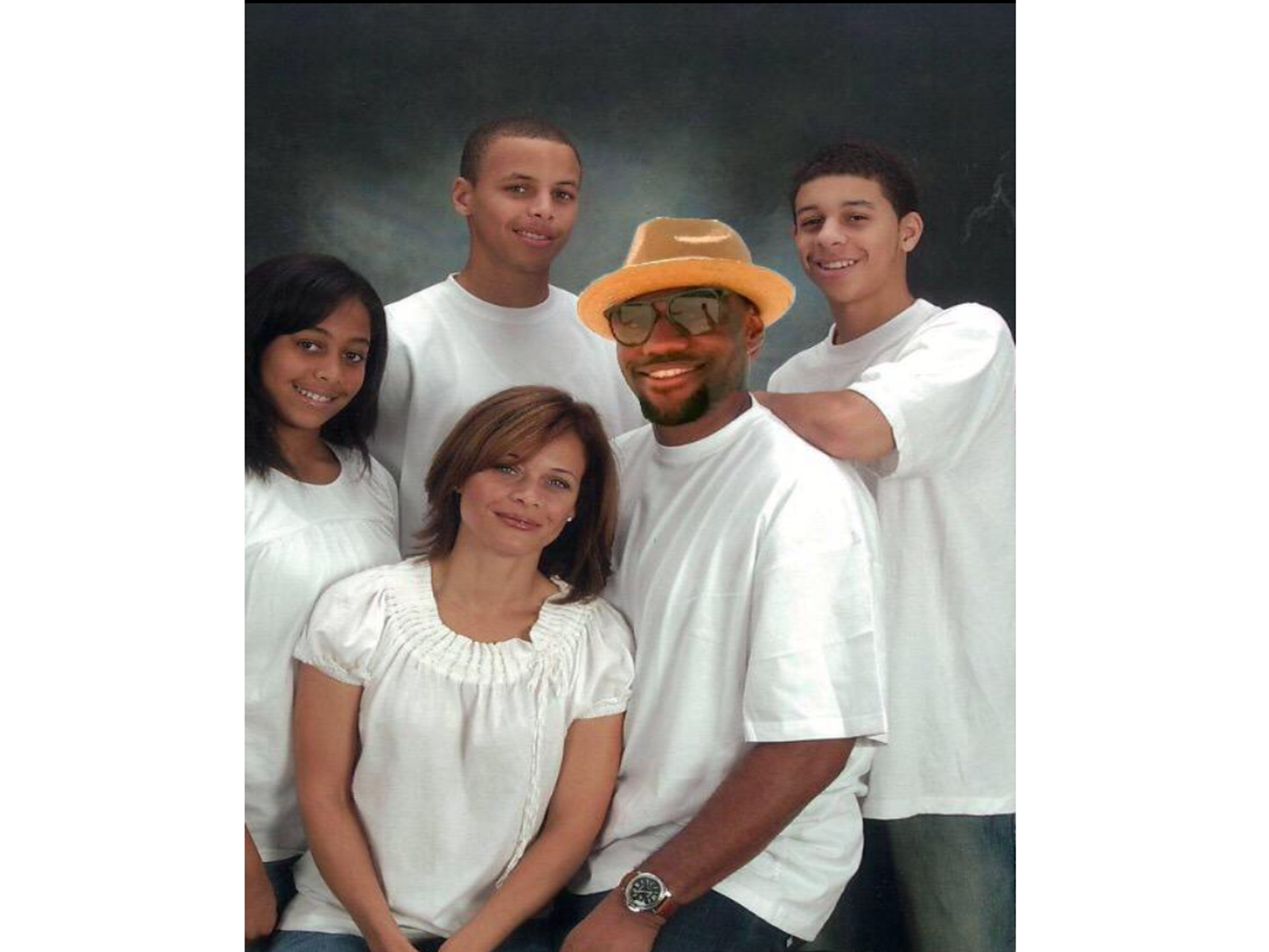 Another photo shows James posing as the father in the Curry family portrait.