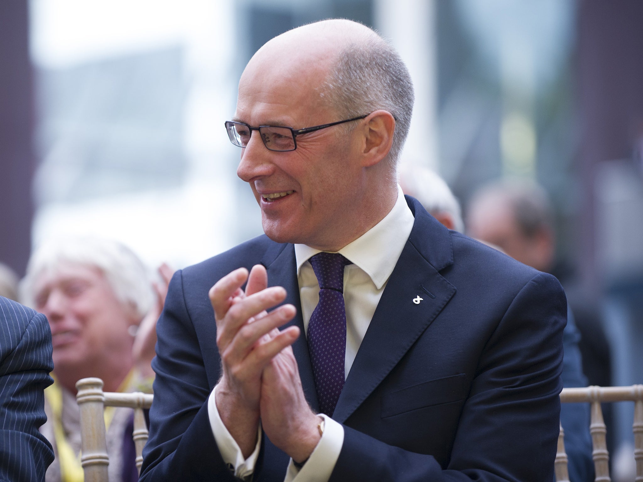 John Swinney has described the proposed spending cut as “too bitter a pill to swallow”