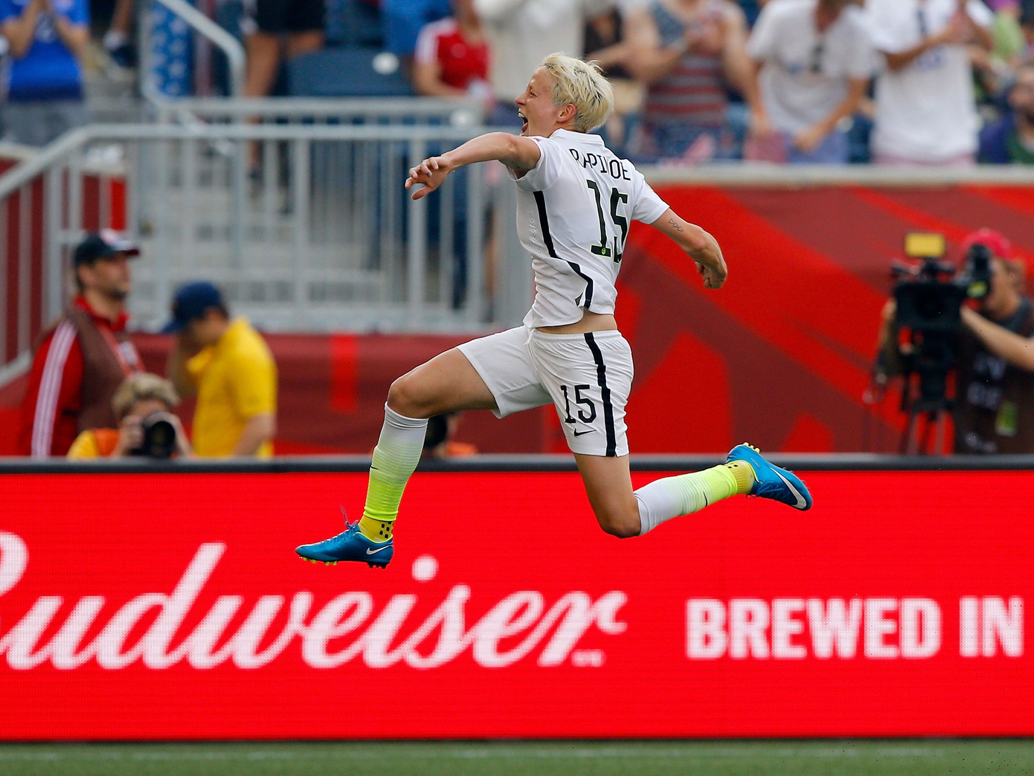 Megan Rapinoe celebrates scoring for the US