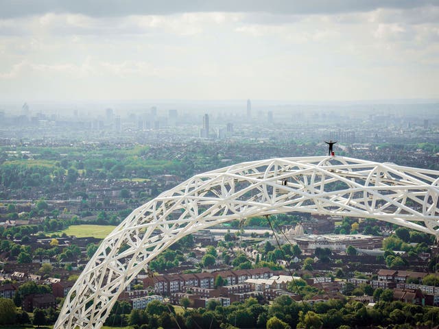 James Kingston admires the view at the summit of the iconic arch