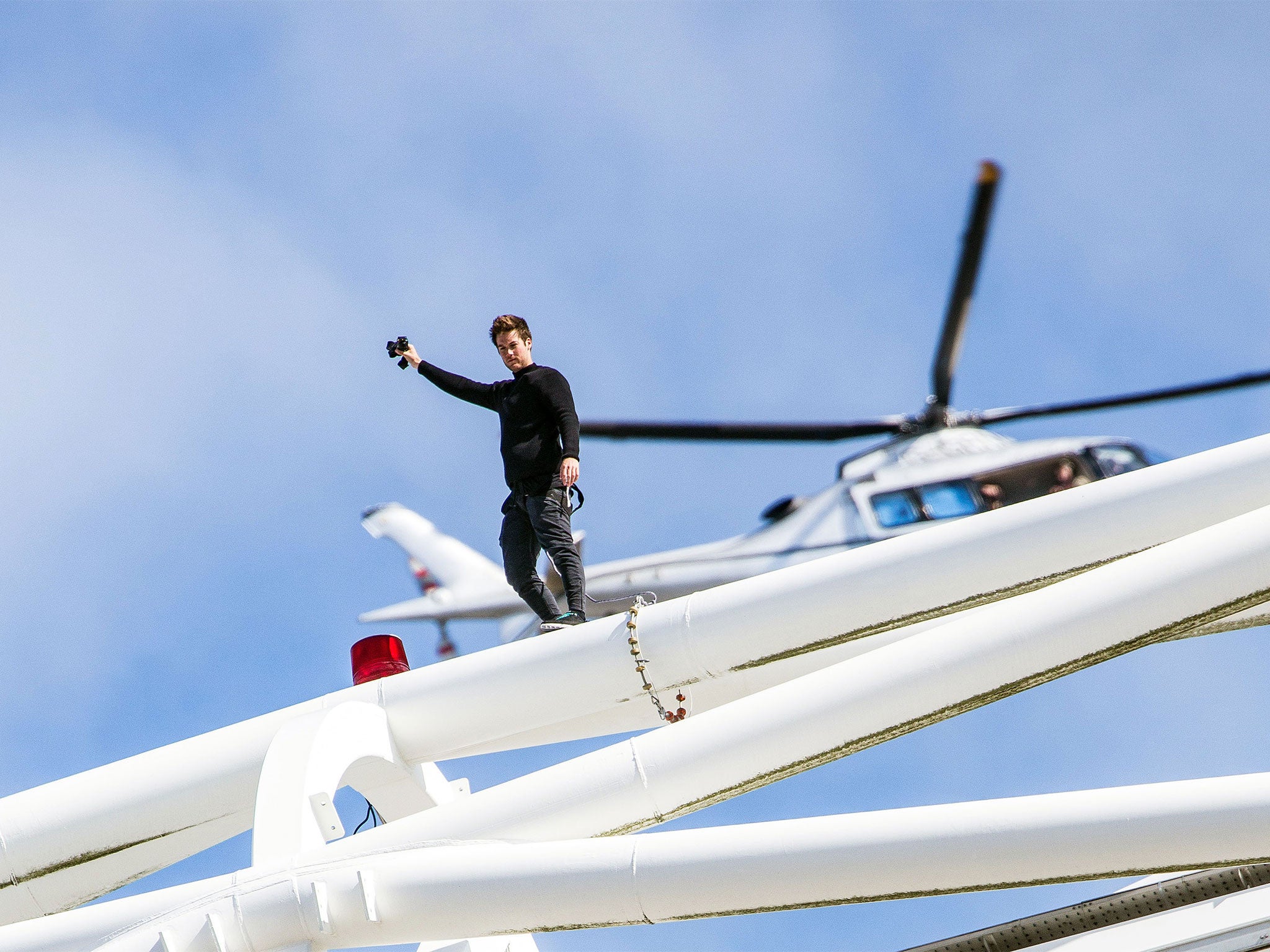 James Kingston live-streaming the climb above Wembley