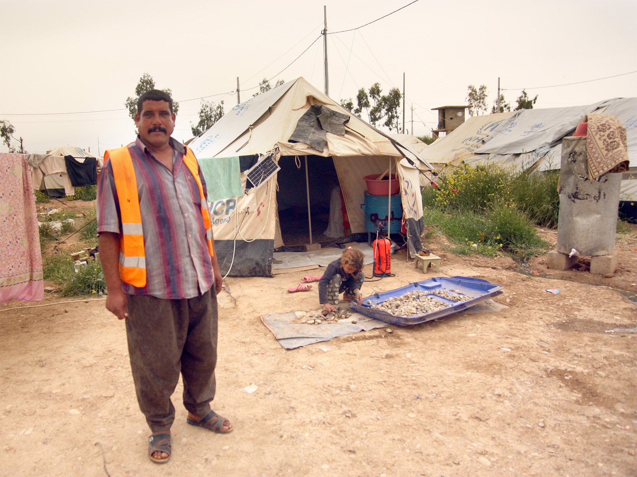 Badr Wana Ahmed, who fled with his family out of Mosul over a year ago, at a refugee camp in the North Iraqi city of Erbil