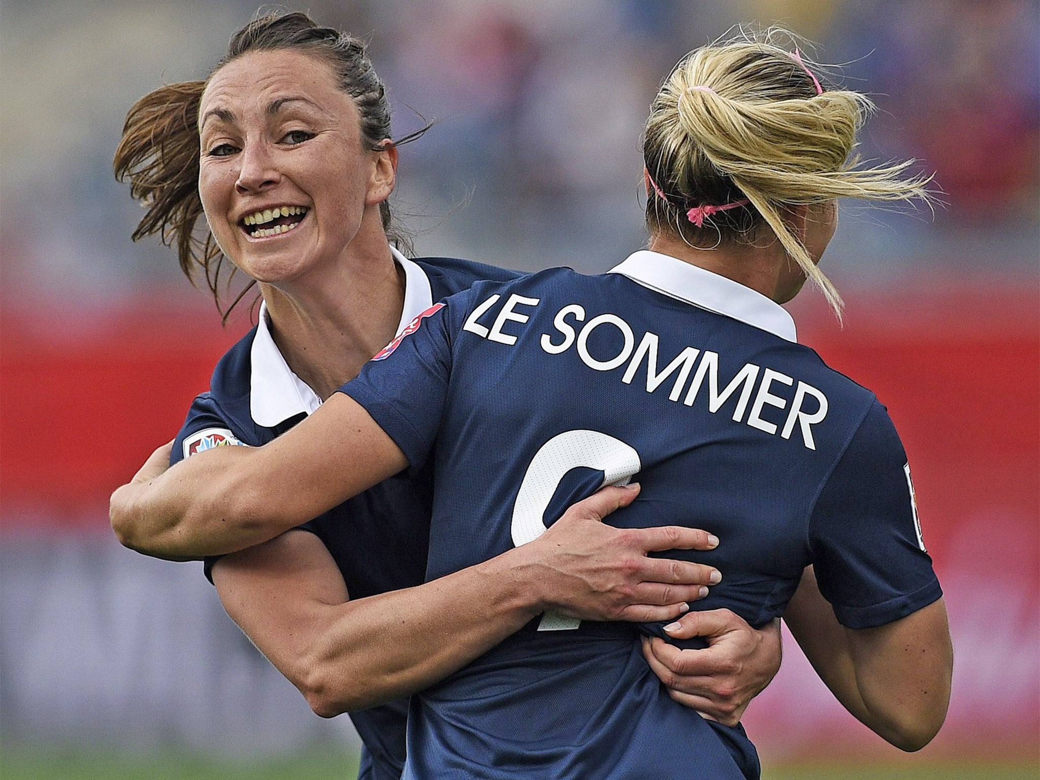 Eugenie Le Sommer is congratuled by Gaetane Thiney after scoring the winner