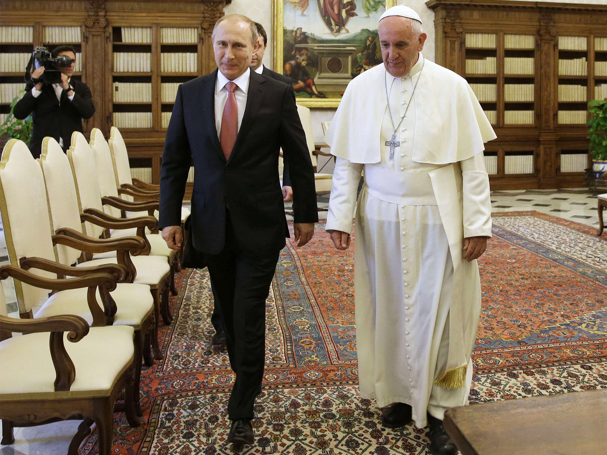 Pope Francis with President Putin after a private audience at the Vatican on Wednesday