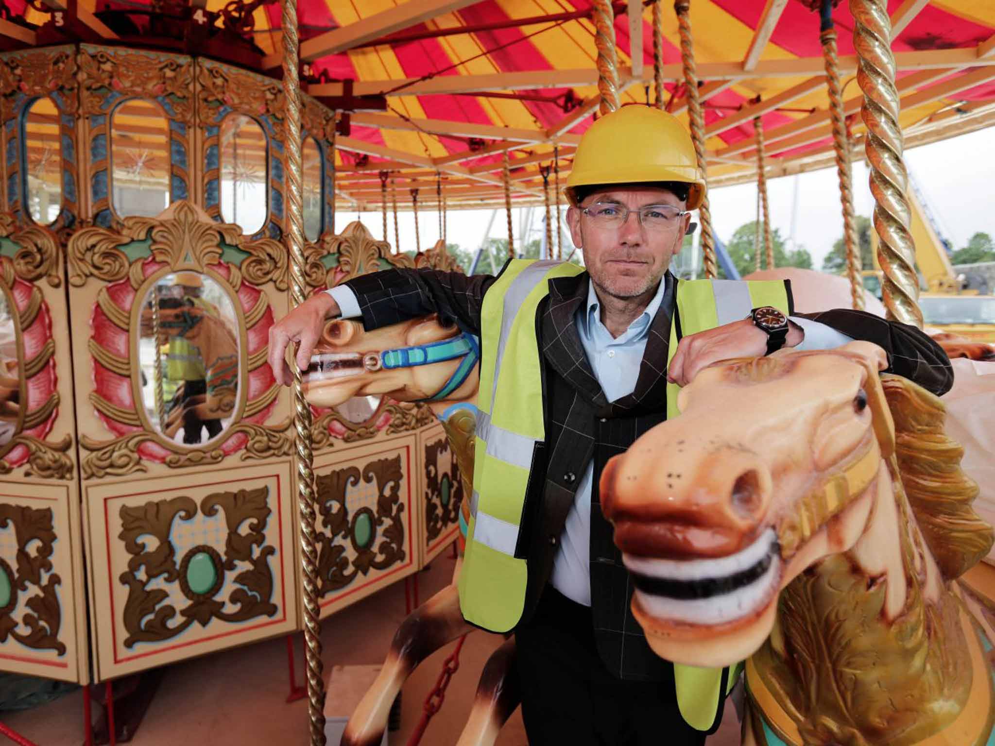 Wayne Hemingway on one of Dreamland's restored rides