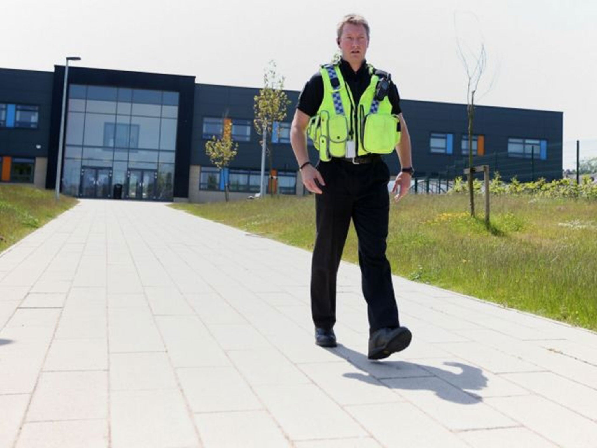 Police outside Dixons Kings Academy after a teacher was stabbed on Thursday