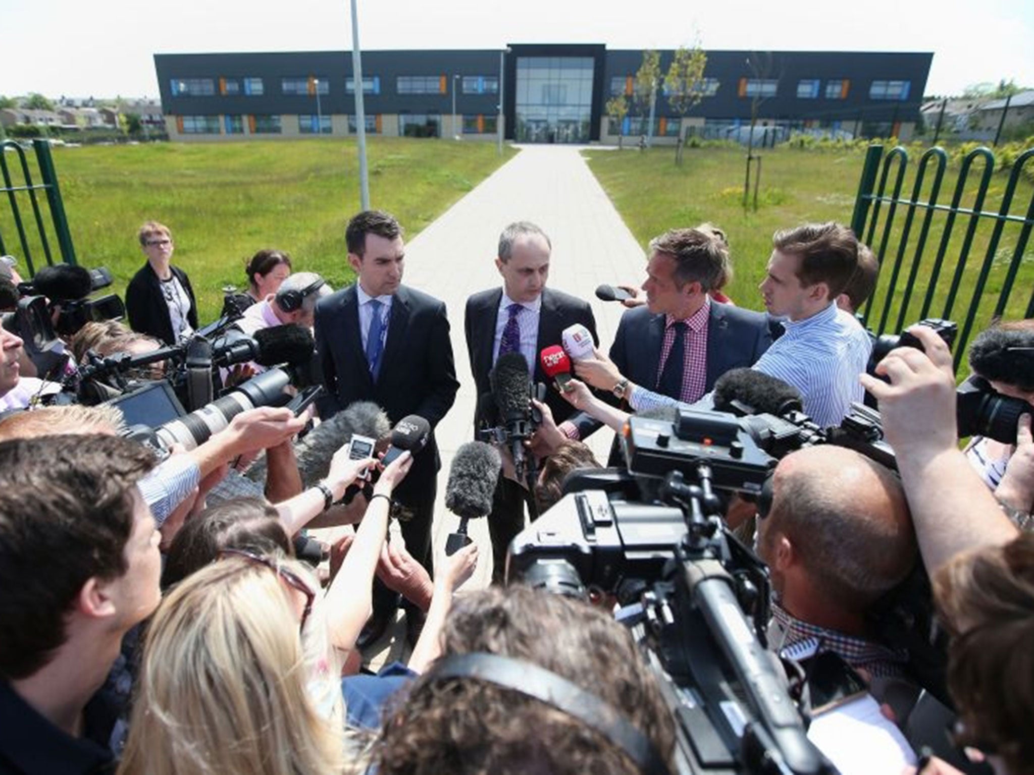 Principal at Dixon Kings Academy, Neil Miley and Executive Principal at Dixon Kings, Nick Weller (centre left) speaking to the media