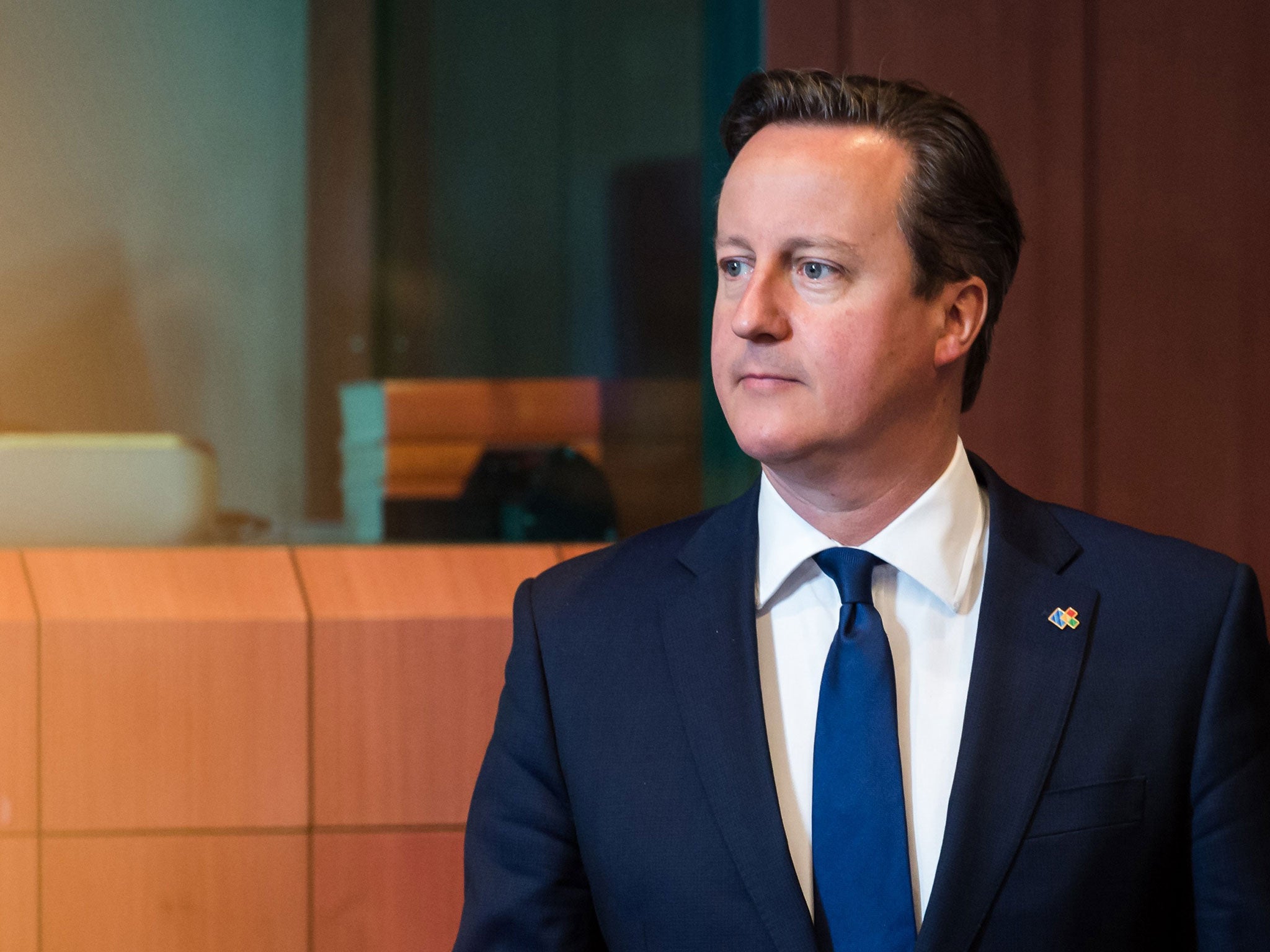 British Prime Minister David Cameron arrives for a round table in Brussels earlier this month