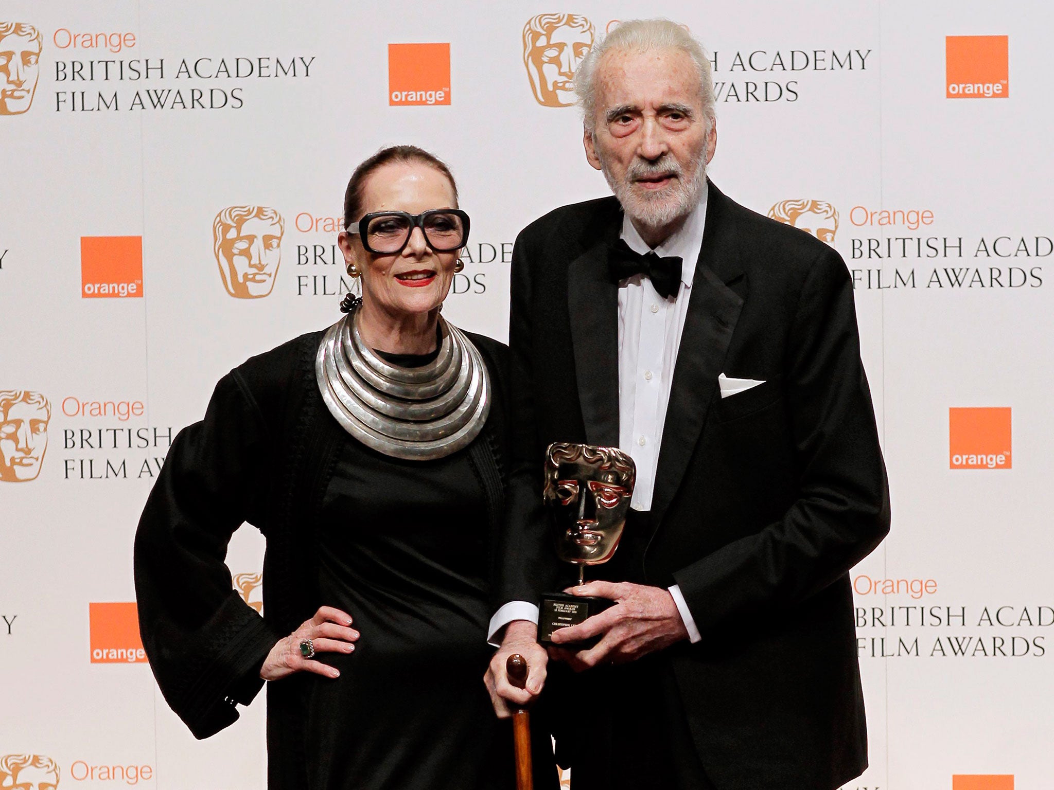 Sir Christopher Lee with his wife, Birgit Kroencke, at the Baftas in 2011