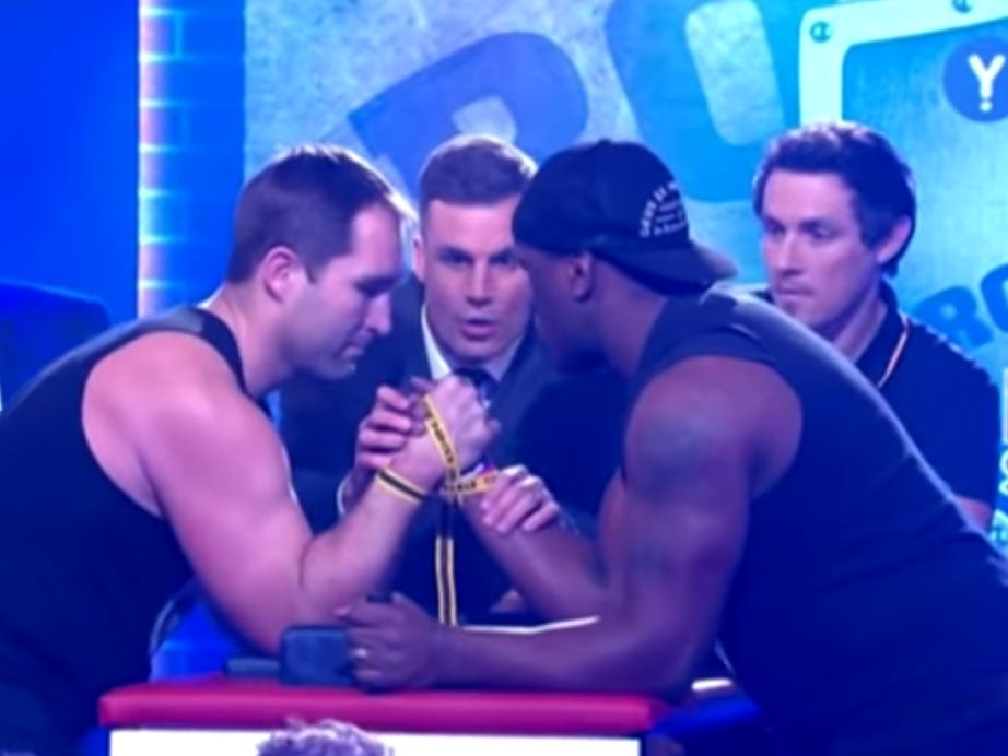 Ben Ross (left) and Wendell Sailor, before their arm wrestle when Ross broke his arm