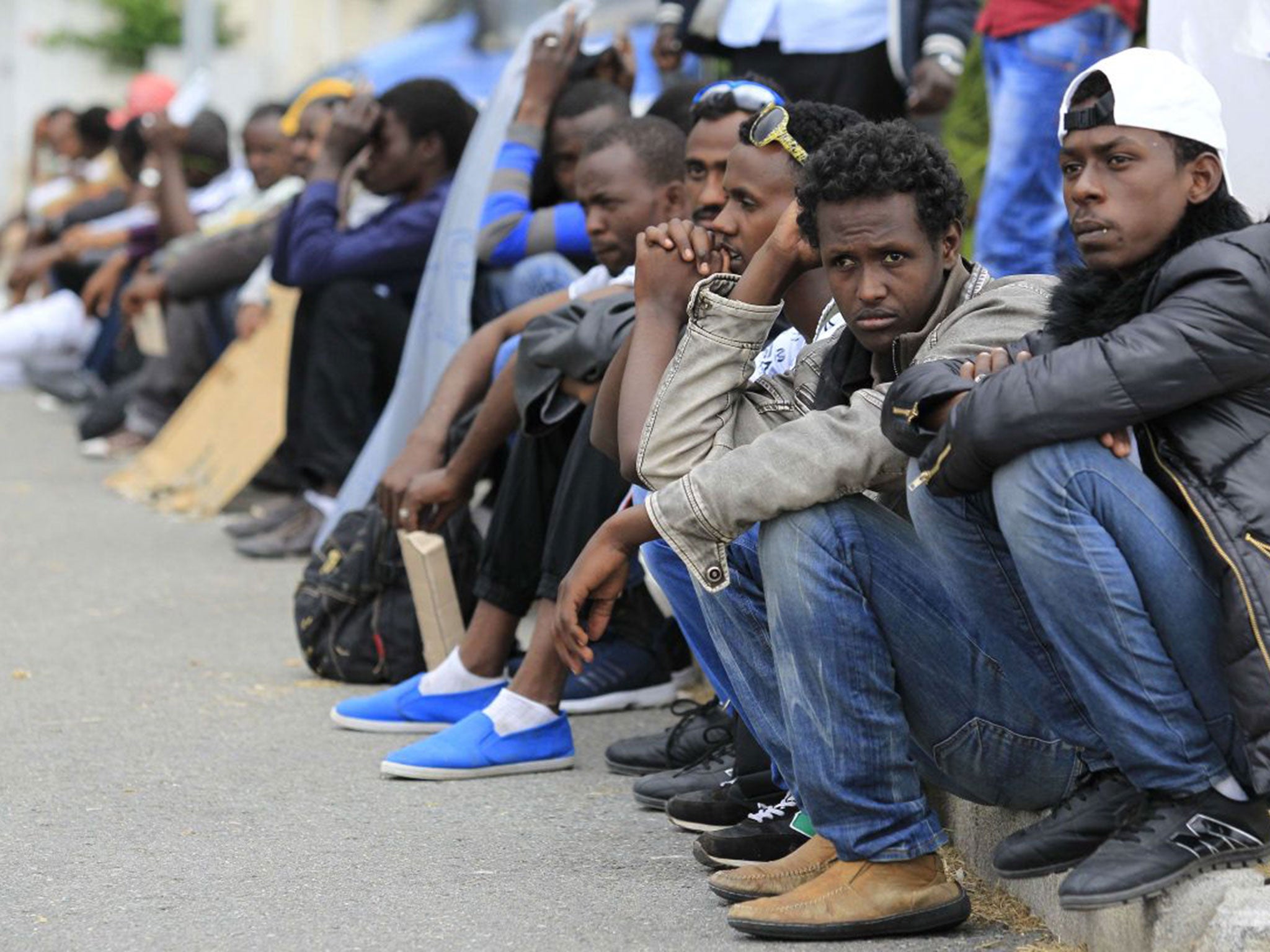 Many hundreds are thought to be waiting in Milan and other cities in Italy until Germany resumes open borders next week