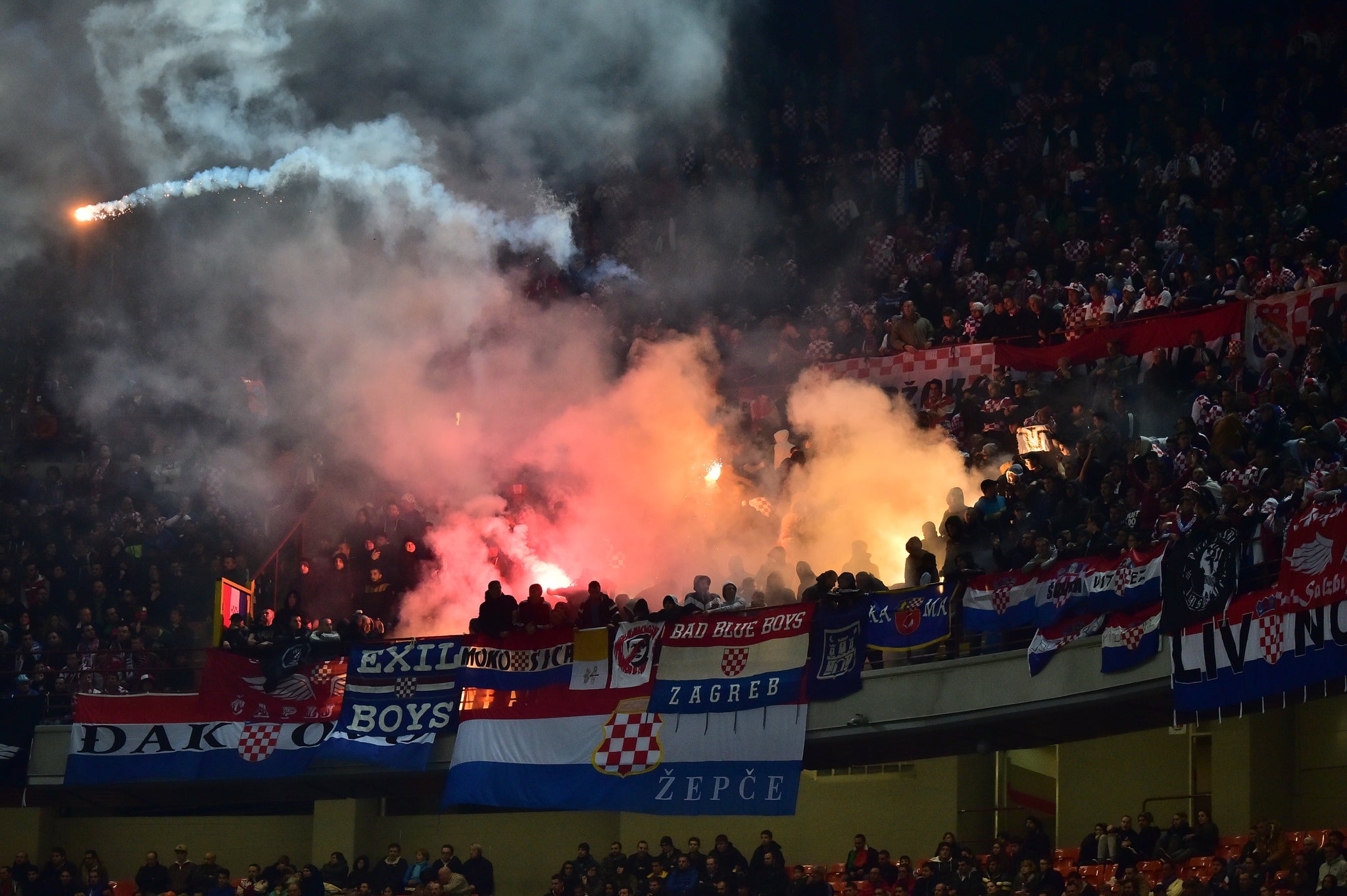 The match was played behind closed doors after some Croatia supporters threw flares and chanted racist slogans at a previous match with Italy in 2014