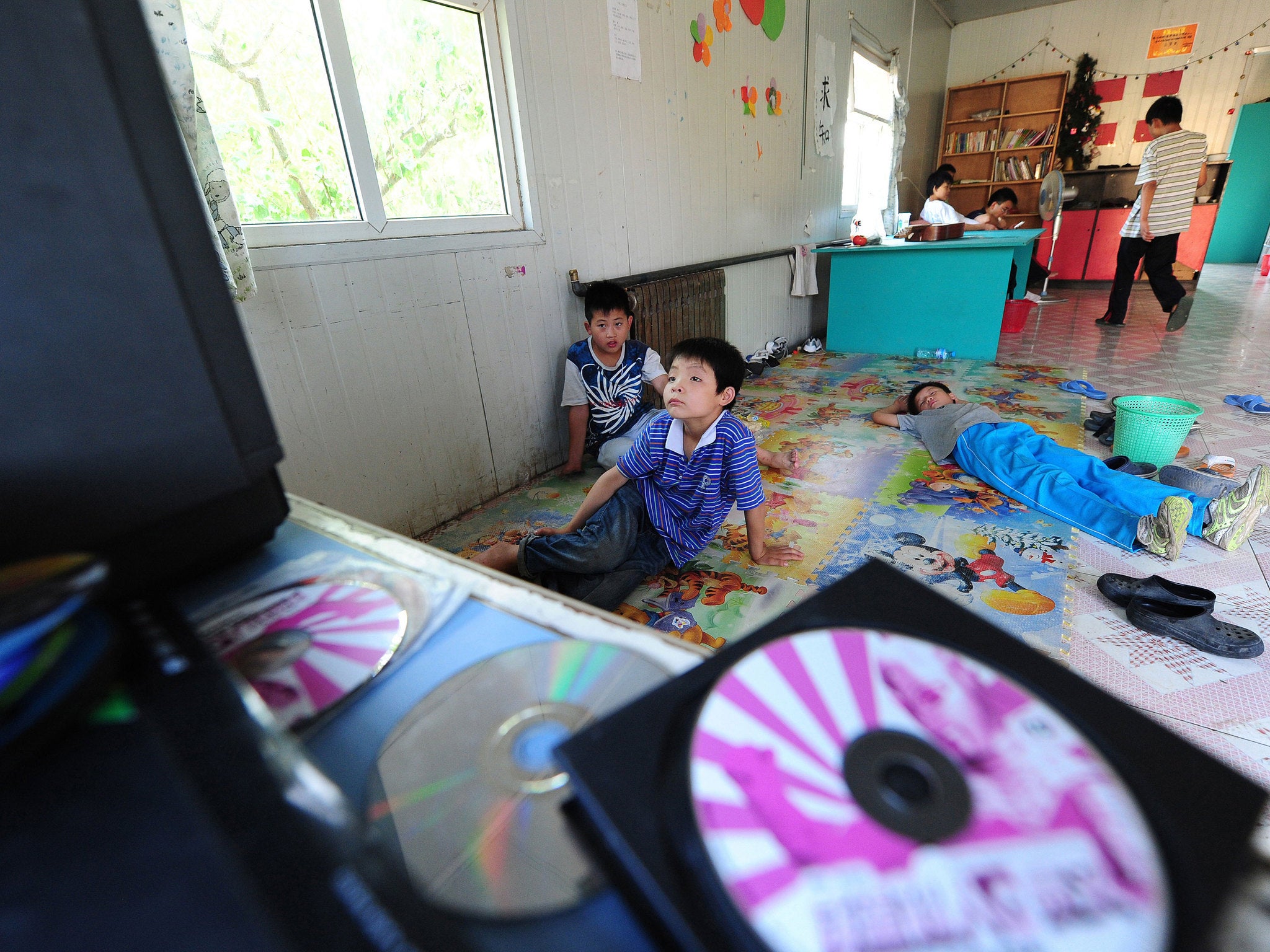 Boys in a home for left-behind children and orphans in Beijing