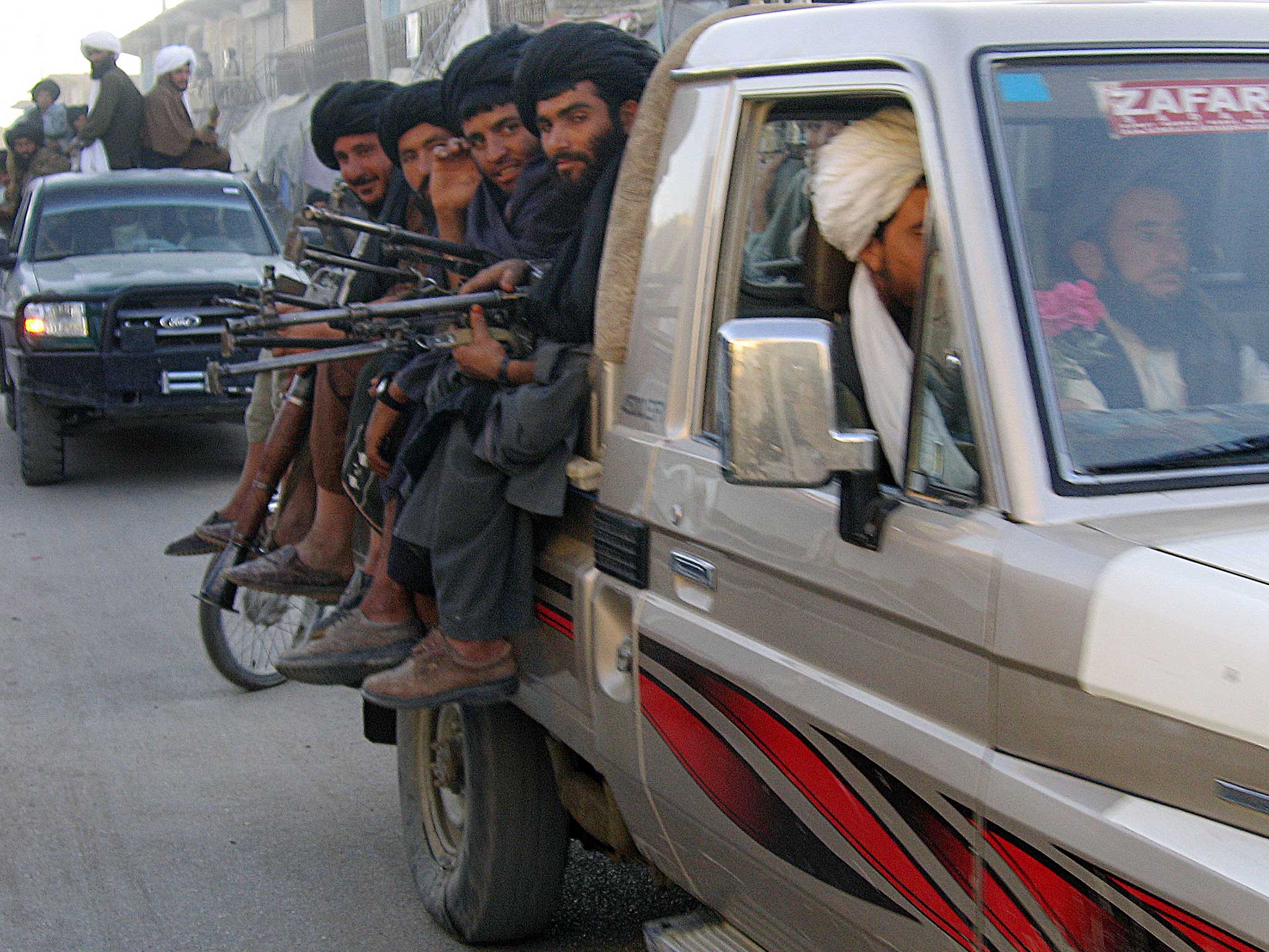 In this 2007 photograph, Taliban fighters arrive in Musa Qala