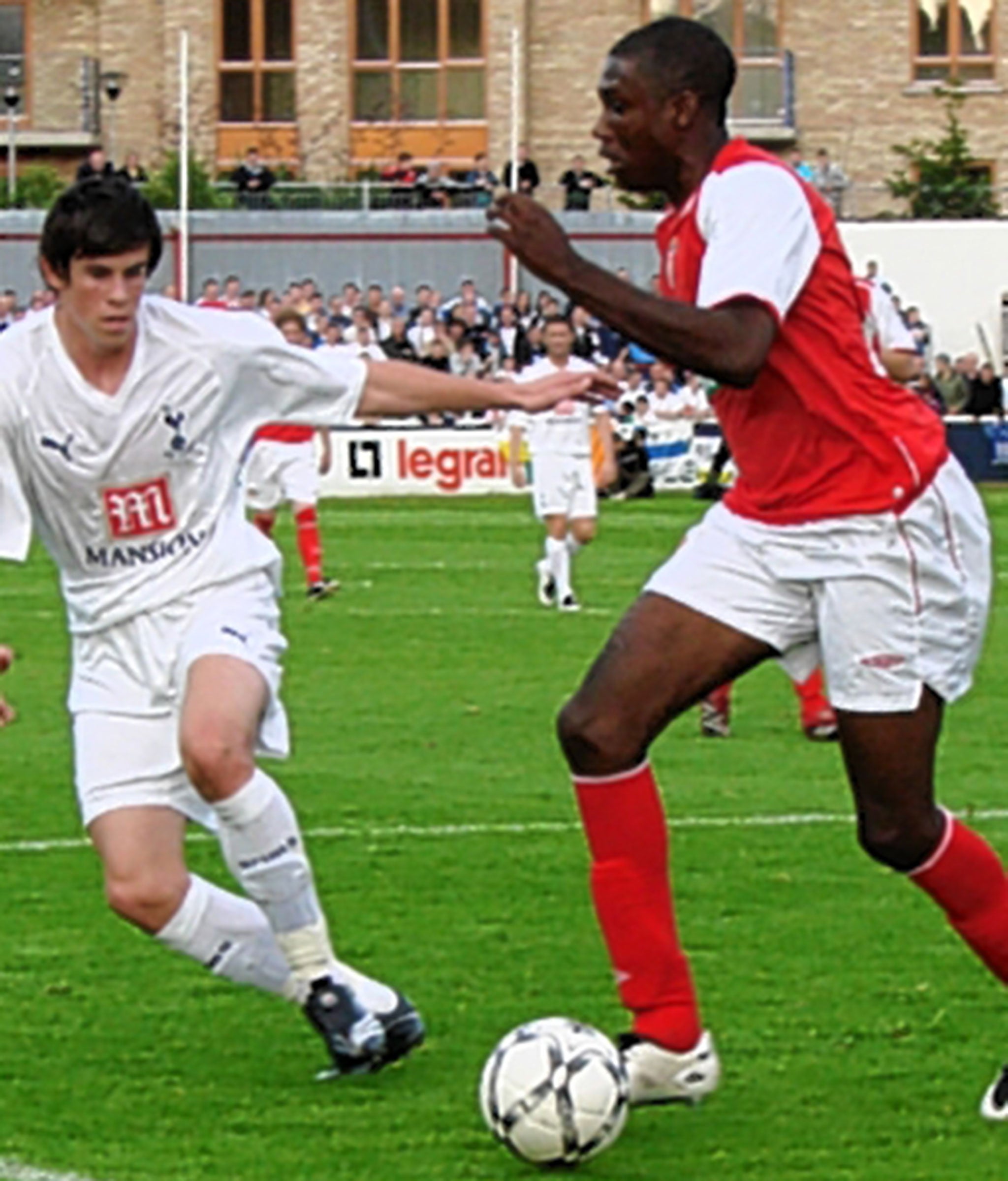 Barker playing for St Patrick’s against Gareth Bale in a friendly versus Tottenham in 2007