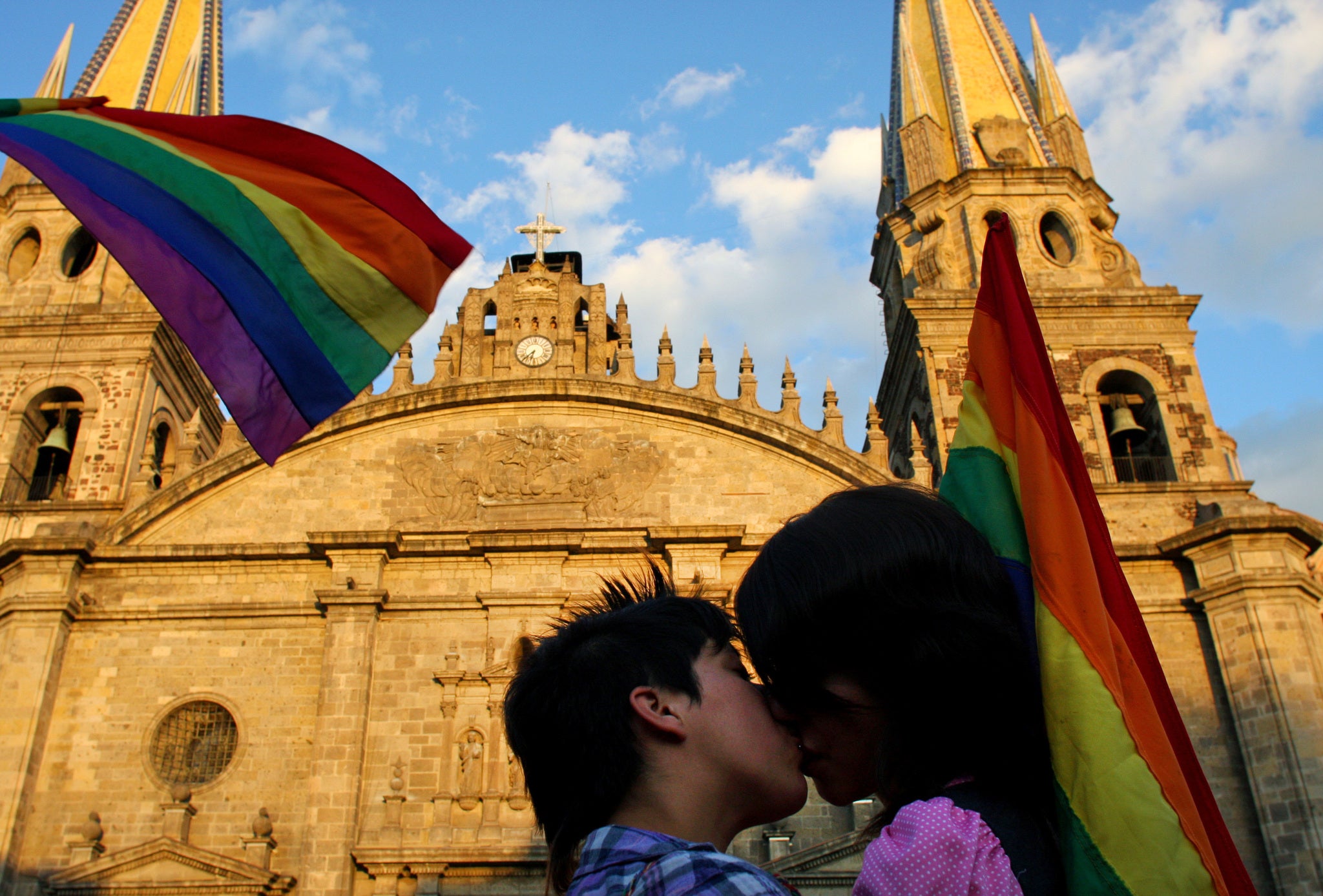 A couple at a demonstration in support of same-sex marriage outside the Metropolitan Cathedral in the Mexican region of Guadalajara (Photo: STR/AFP/Getty Images)