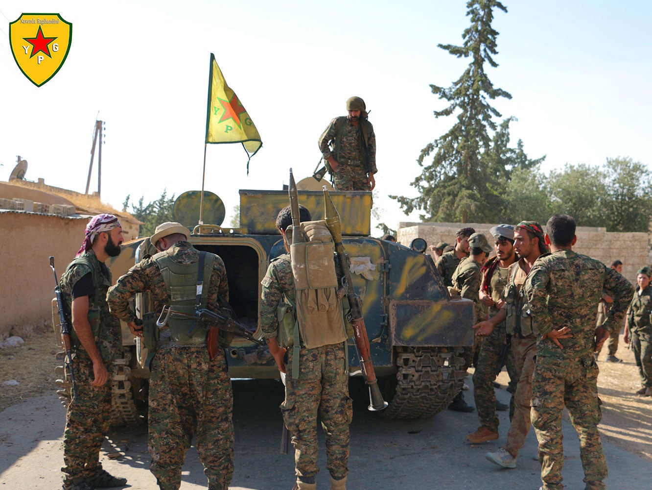 Photos posted on the YPG's website claiming to show Kurdish fighters inside Tal Abyad