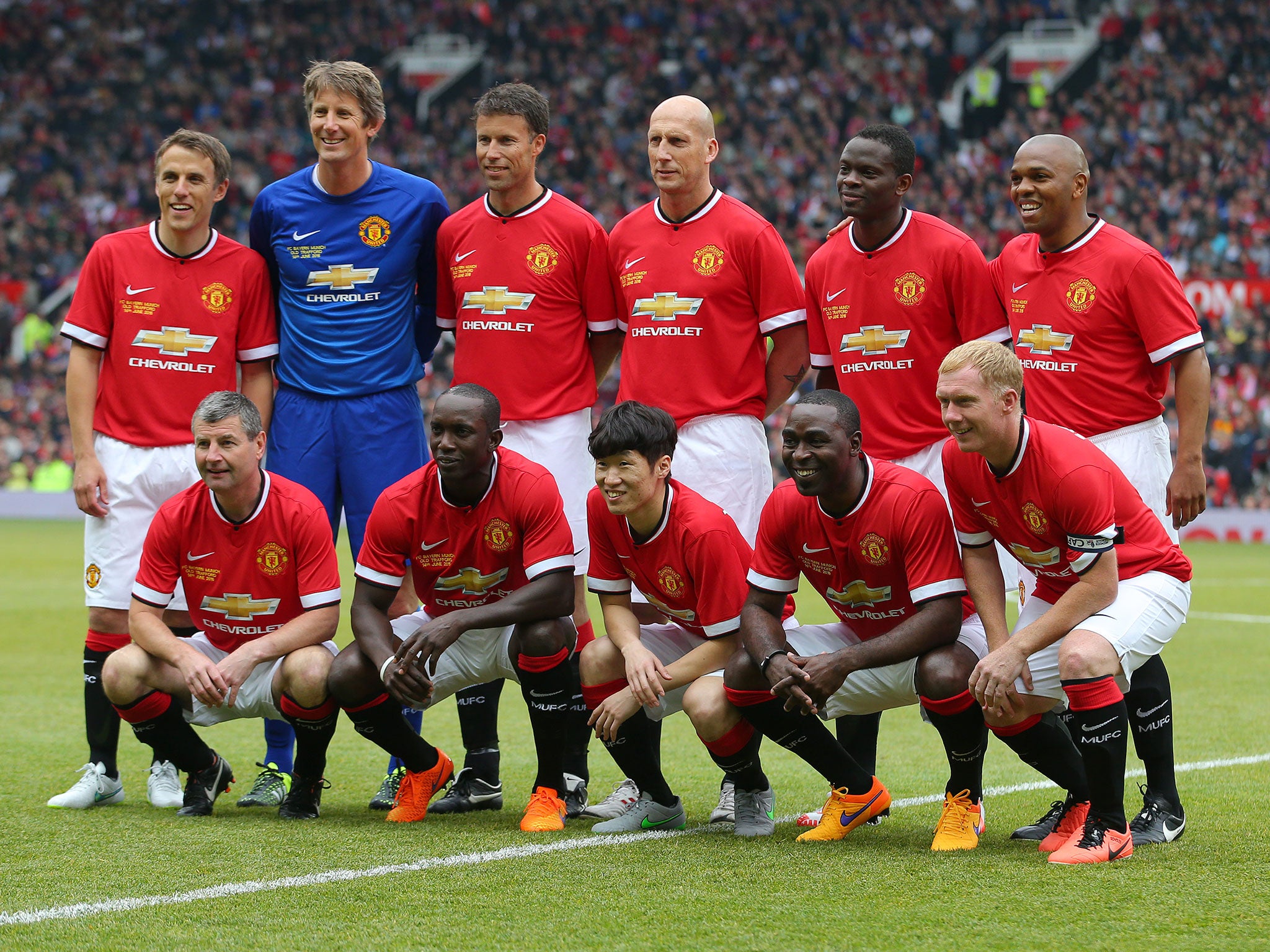 Manchester United's Legends team pose for a squad photo