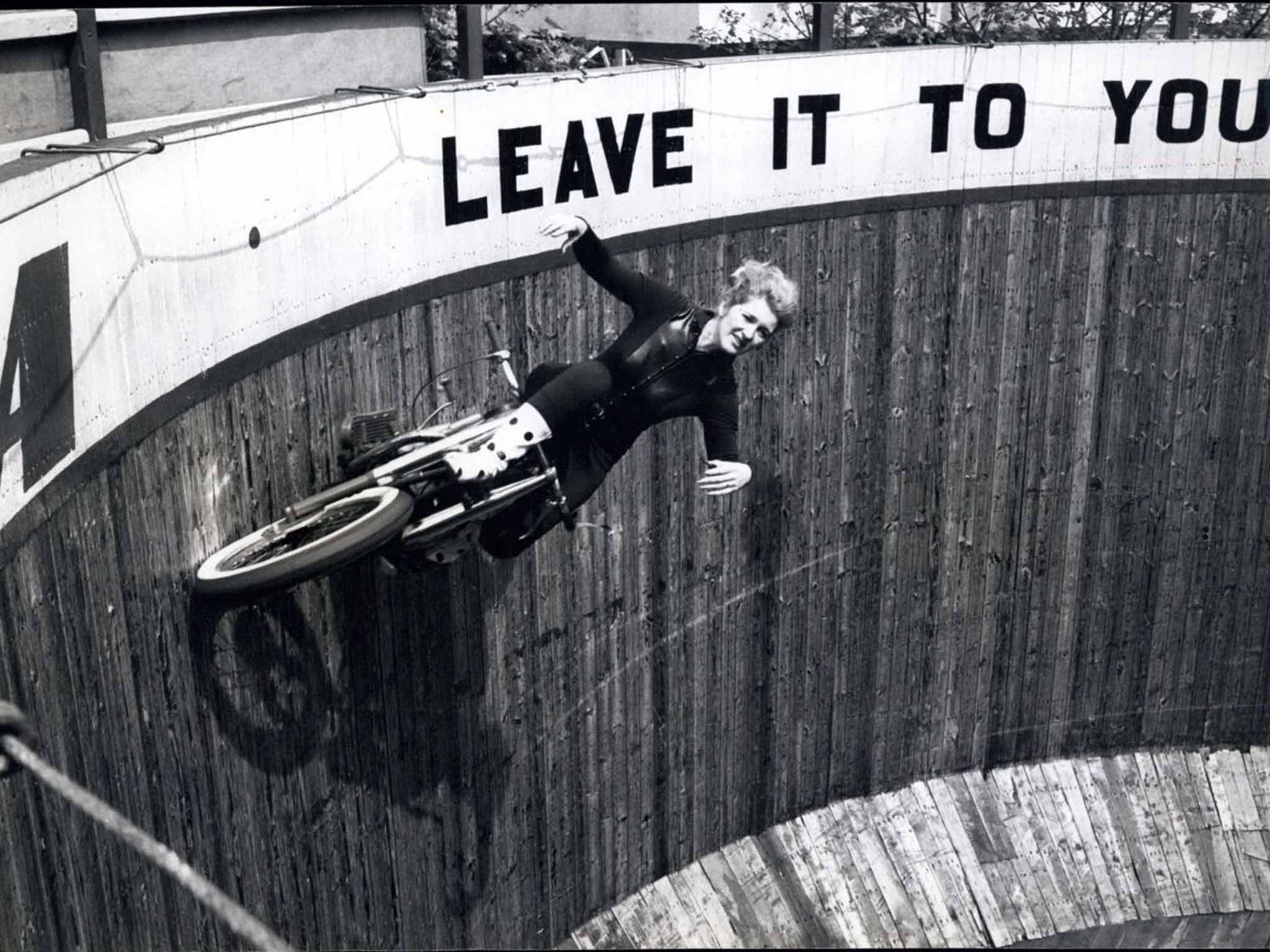 Lady in danger: Yvonne Stagg, who once rode the Wall of Death the day before she was due to give birth, doing what she did best