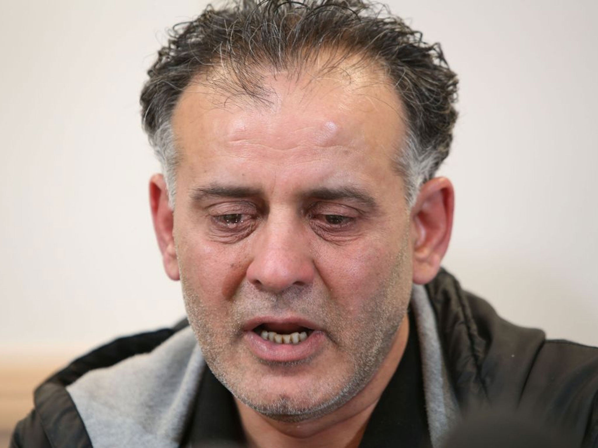 Akhtar Iqbal cries as a pleads for his wife to come home (Image: PA)