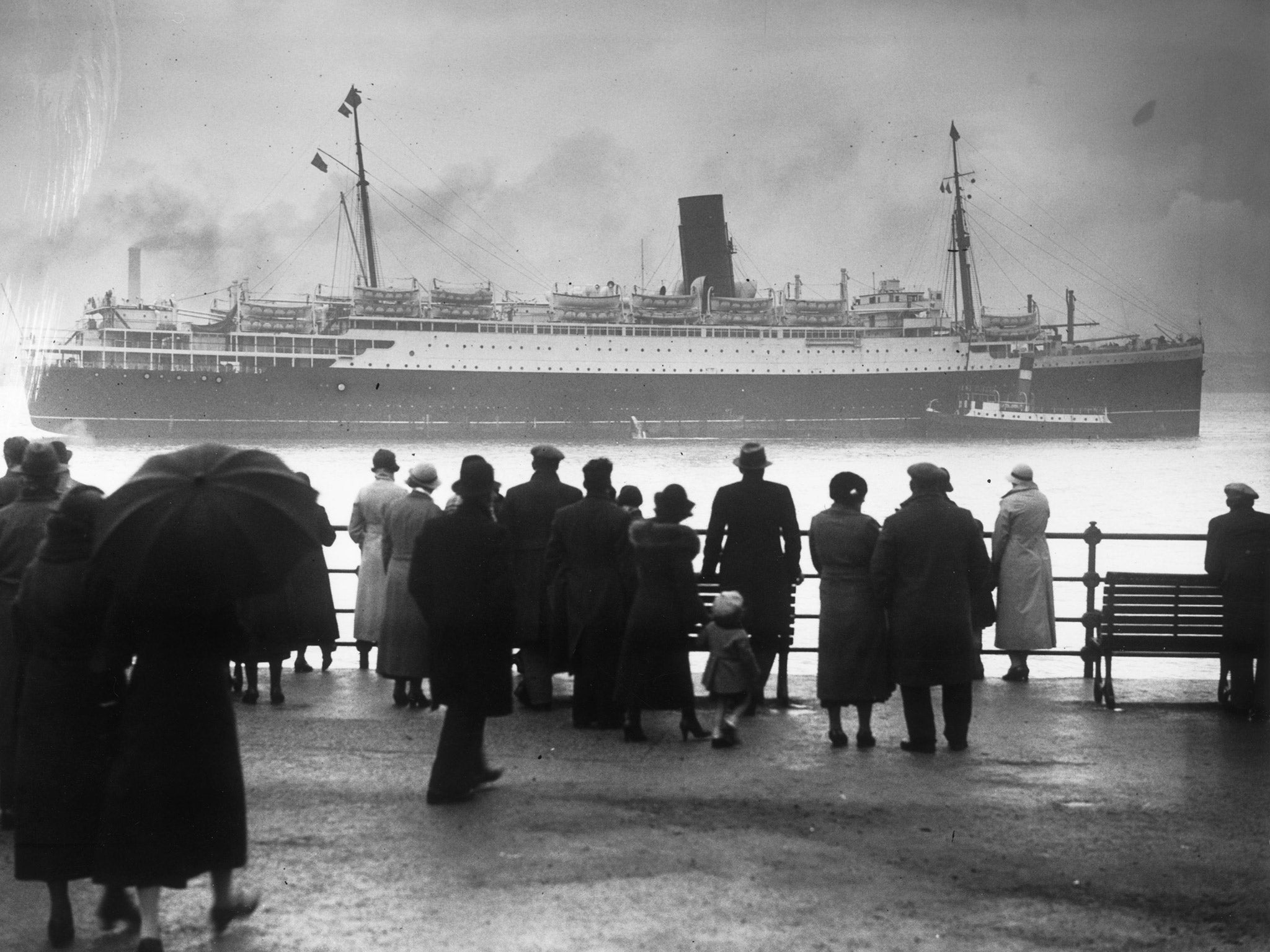 Crowds gather to see the 16,243-ton Cunard cruise liner Lancastria, in October 1936. She was bombed and sunk in 1940 with the loss of an estimated 4,000 people, the worst disaster ever to befall a British ship (Getty)