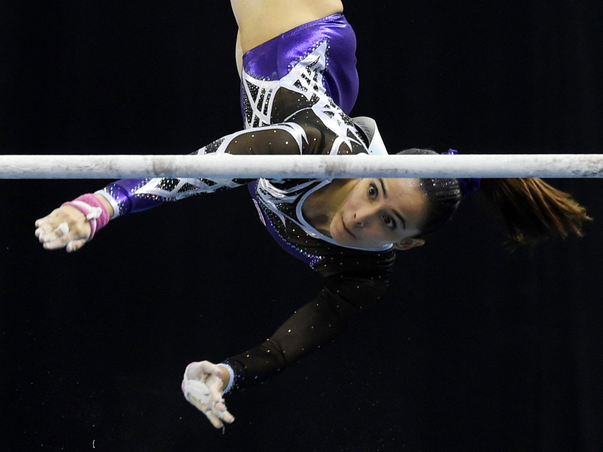 Malaysia's Farah Ann Abdul Hadi competes on the uneven bars during the women's individual all-around gymnastics final at the SEA Games, where she took home six medals, including two golds