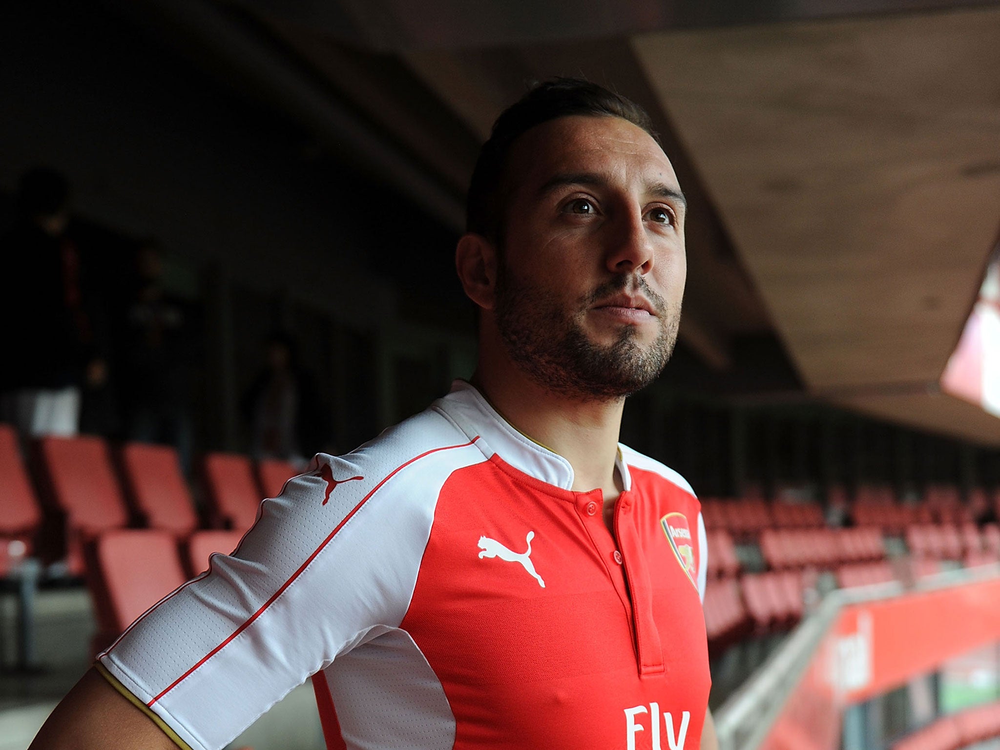 Santi Cazorla models Arsenal's new home shirt