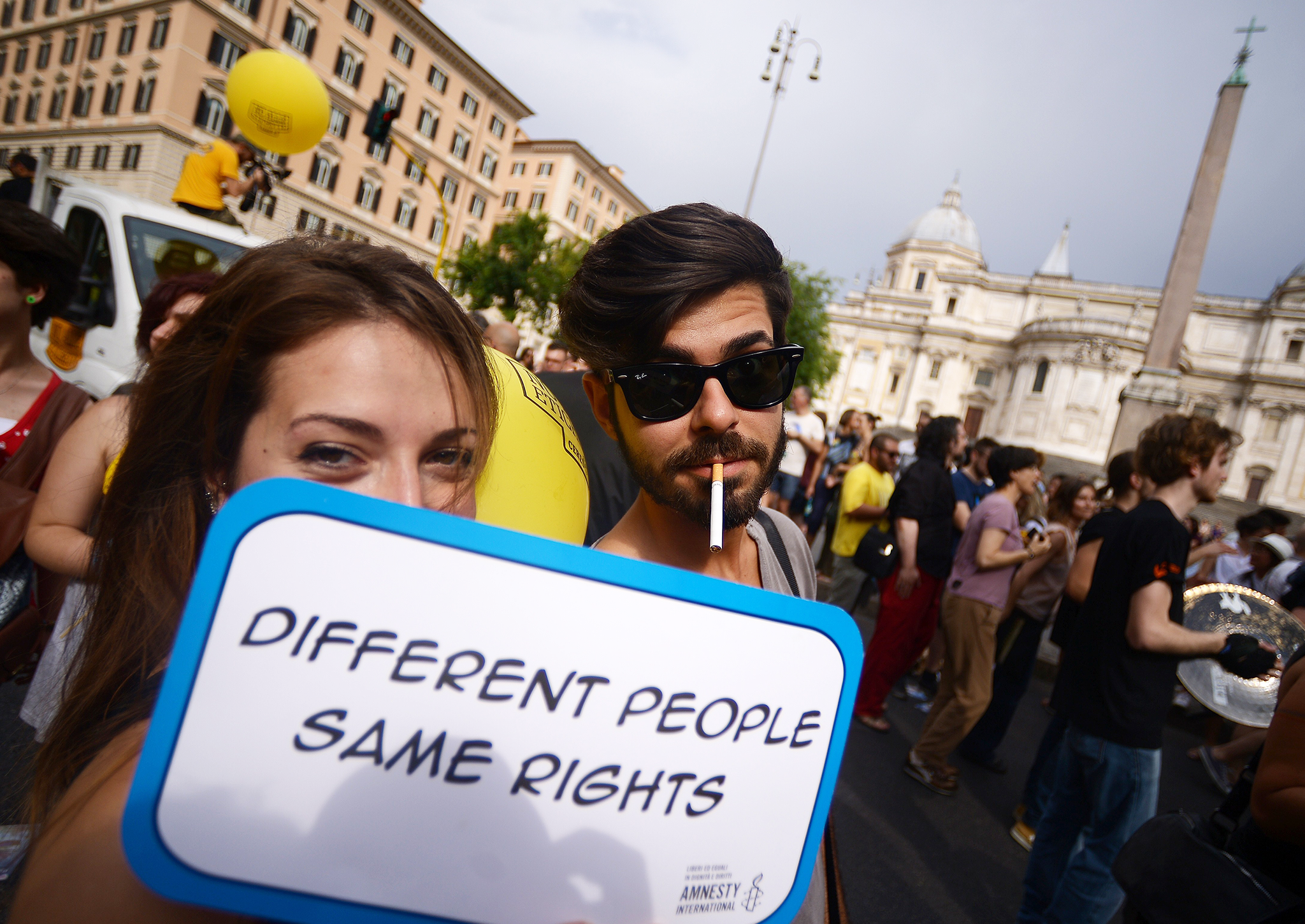 "How the world has flipped on its axis when right-wingers are asking to march in gay pride and gay activists are banning them" People take part in Rome's Pride Parade, June 13, 2015