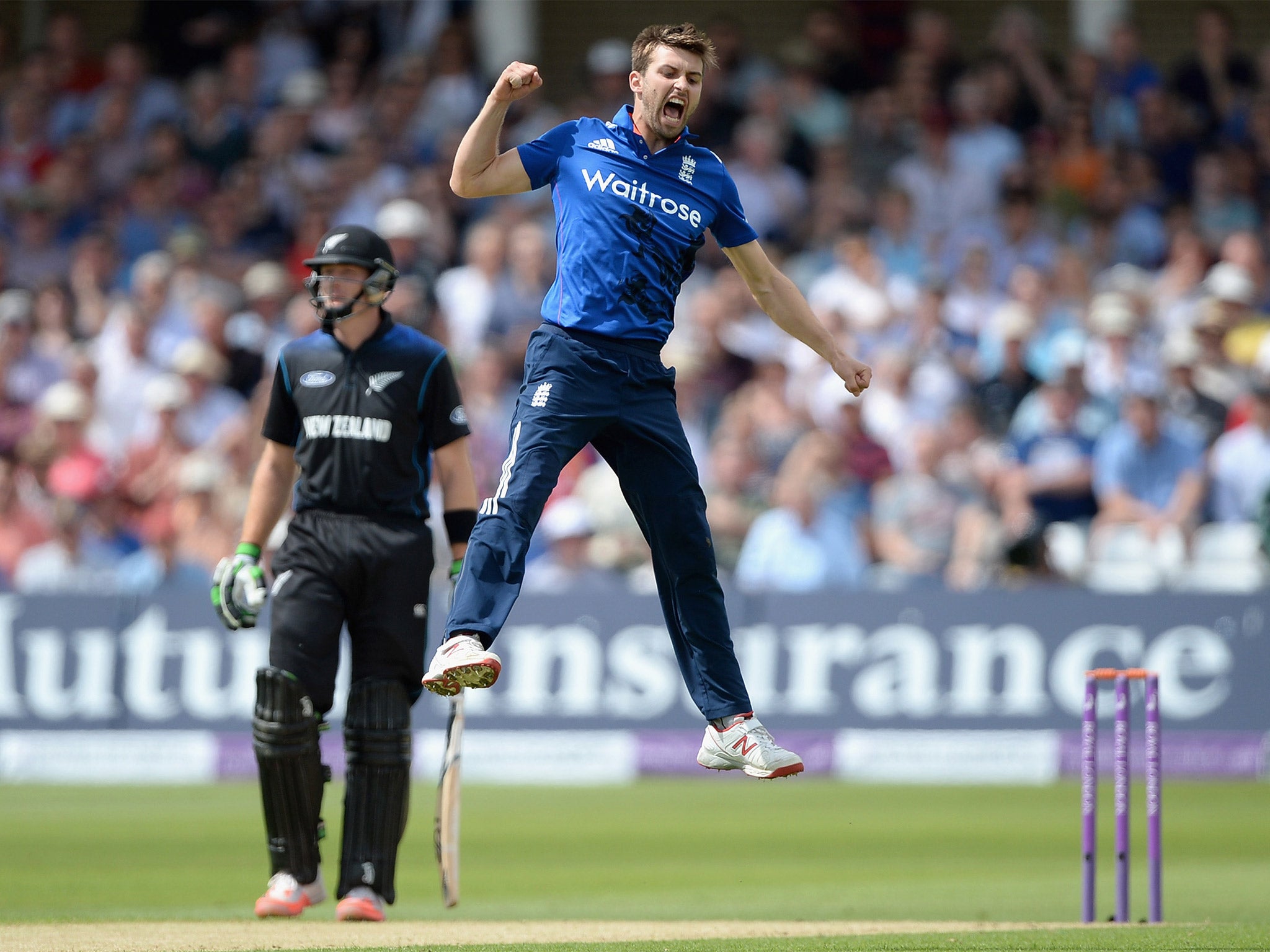 England’s Mark Wood celebrates dismissing Brendon McCullum (Getty)