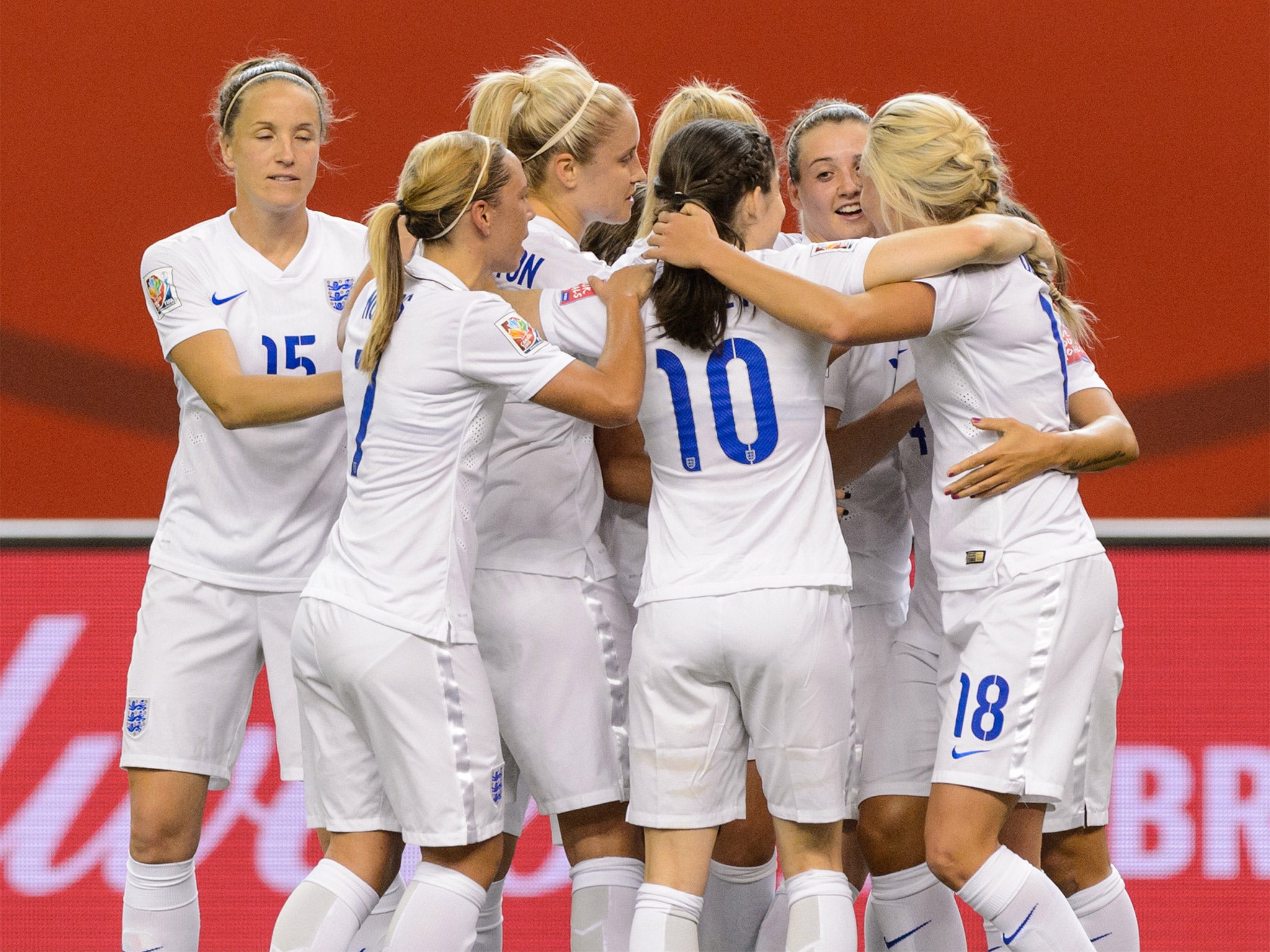 England players celebrate Fara Williams’ penalty last night