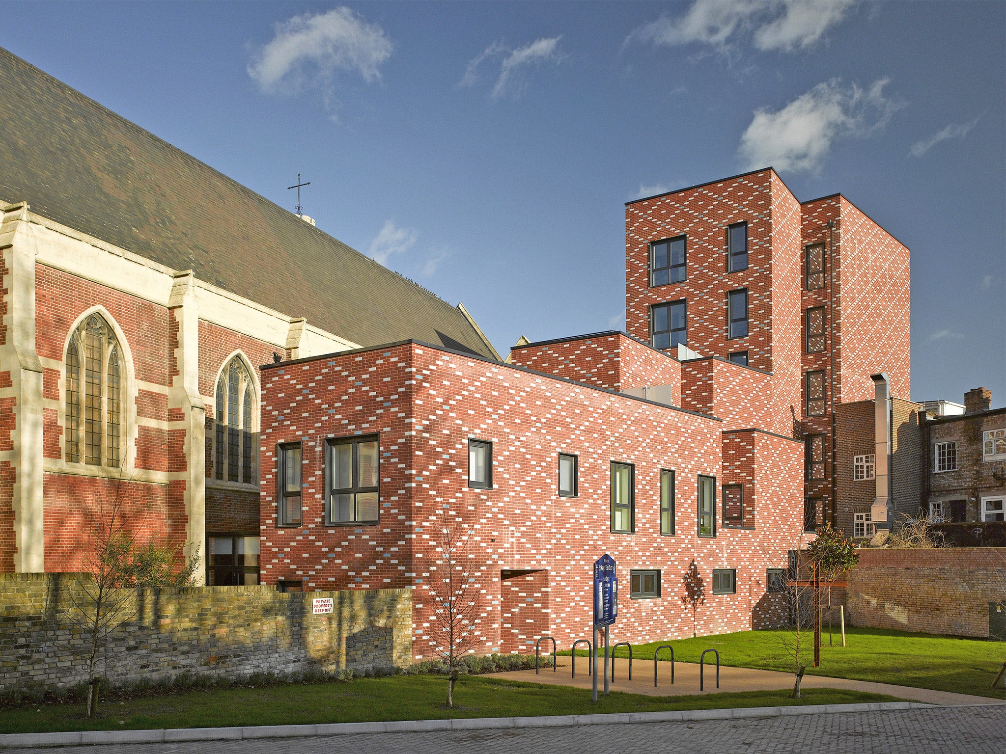 Building around St Mary of Eton Church in east London, architects have created 27 new homes