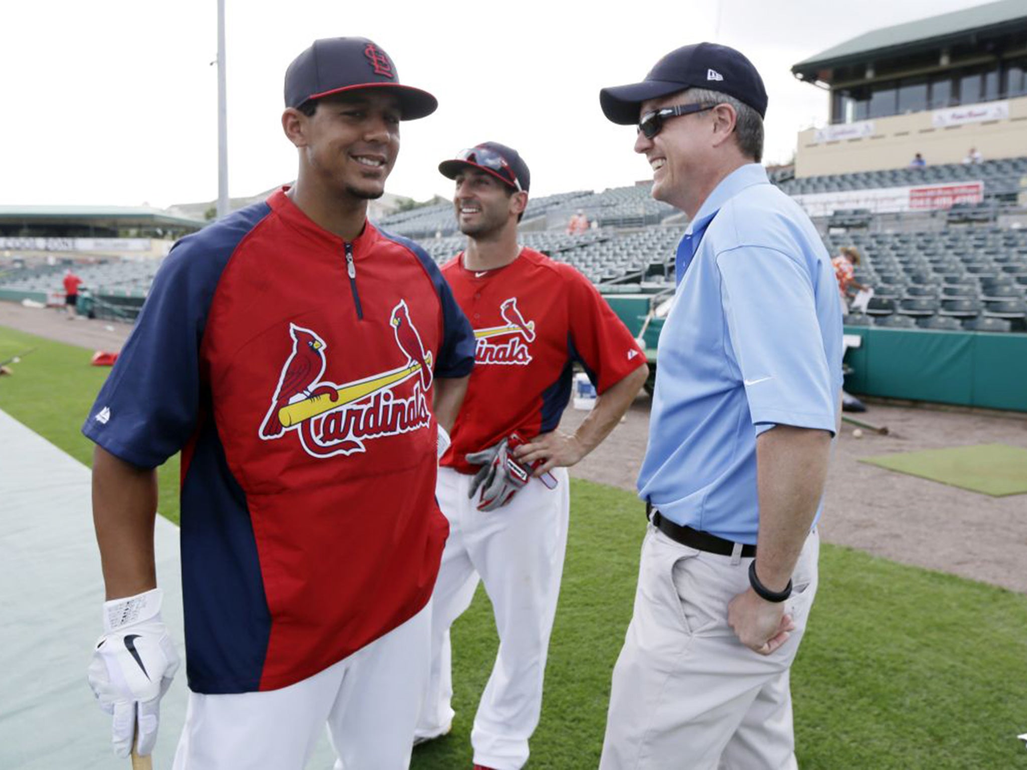 Houston Astros general manager Jeff Luhnow, right, with St Louis Cardinals players