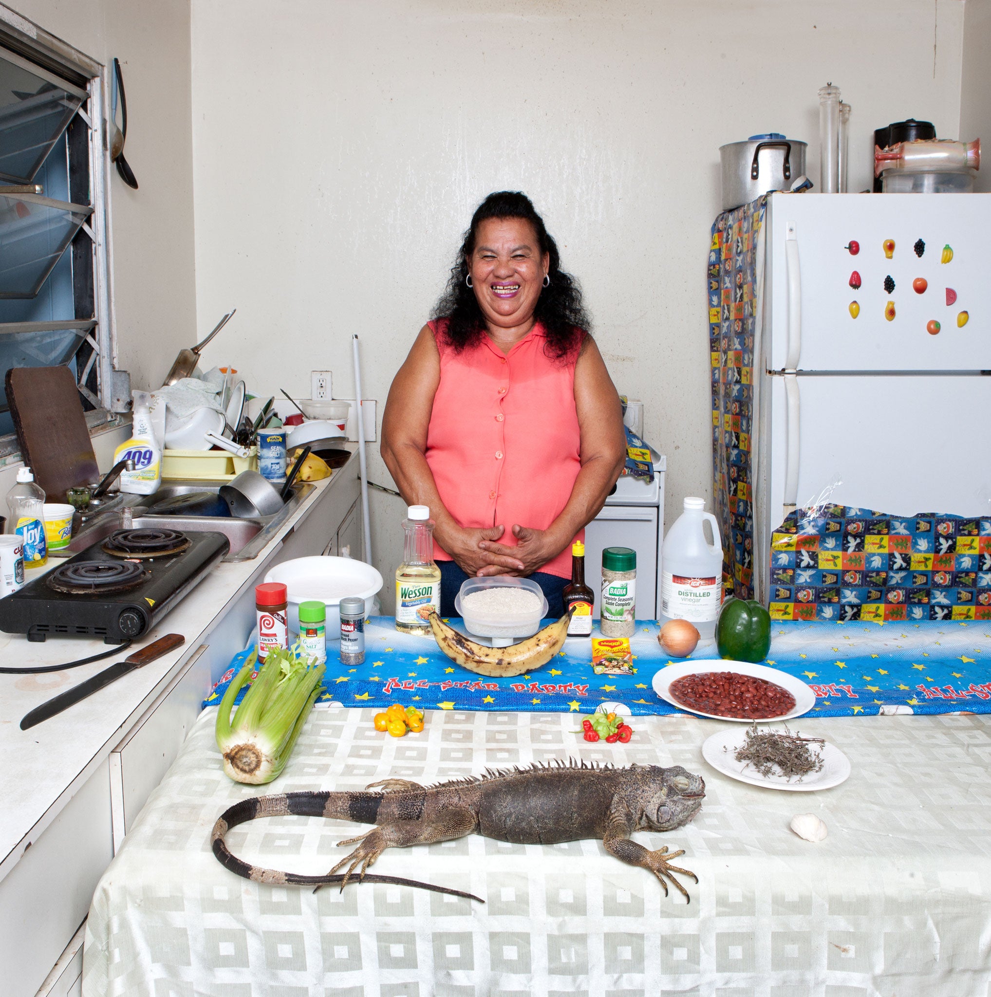 Maria Luz Fedric with the ingredients for her Honduran iguana with rice and beans