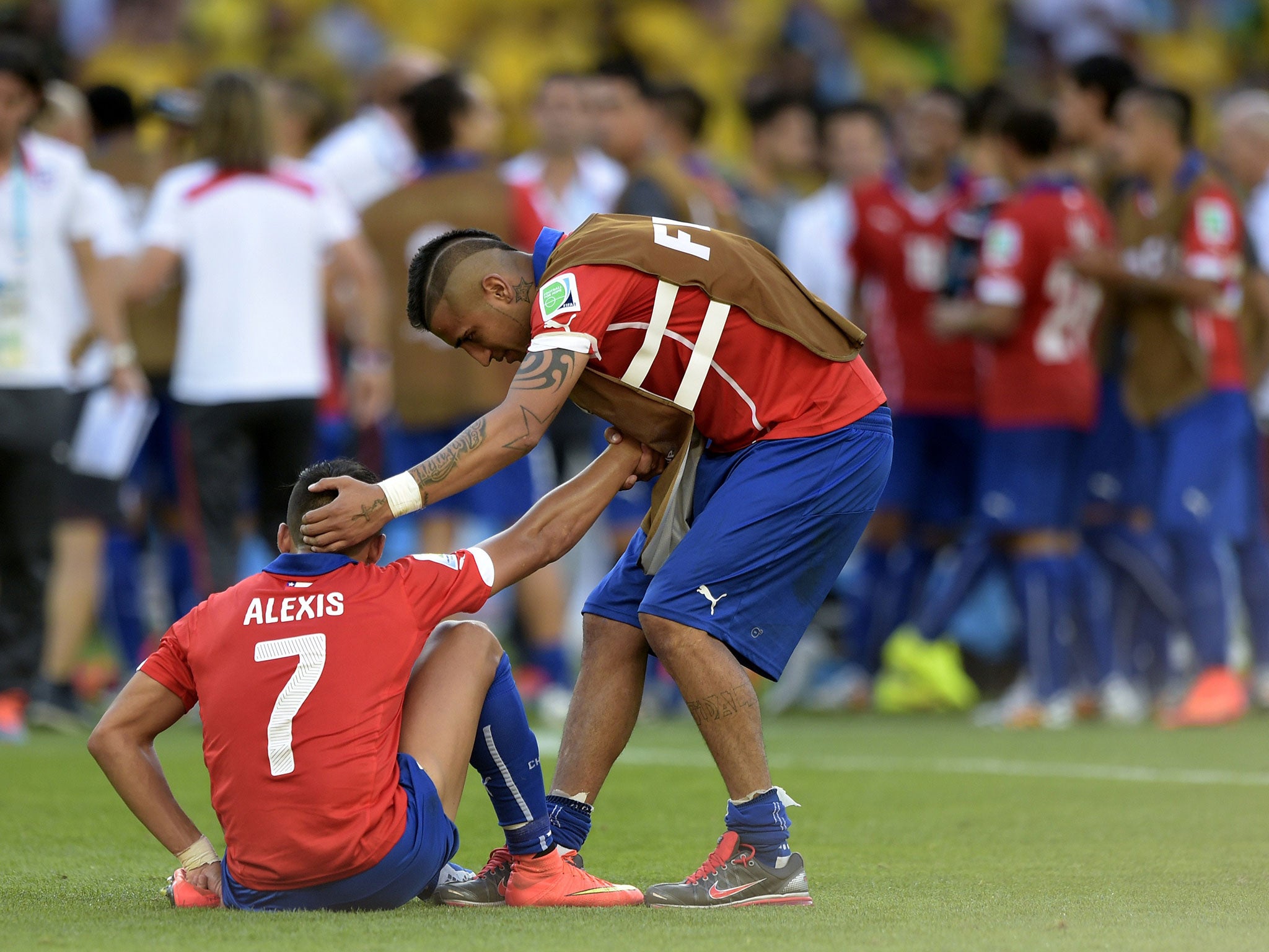 Vidal and Sanchez following Chile's 2014 World Cup elimination