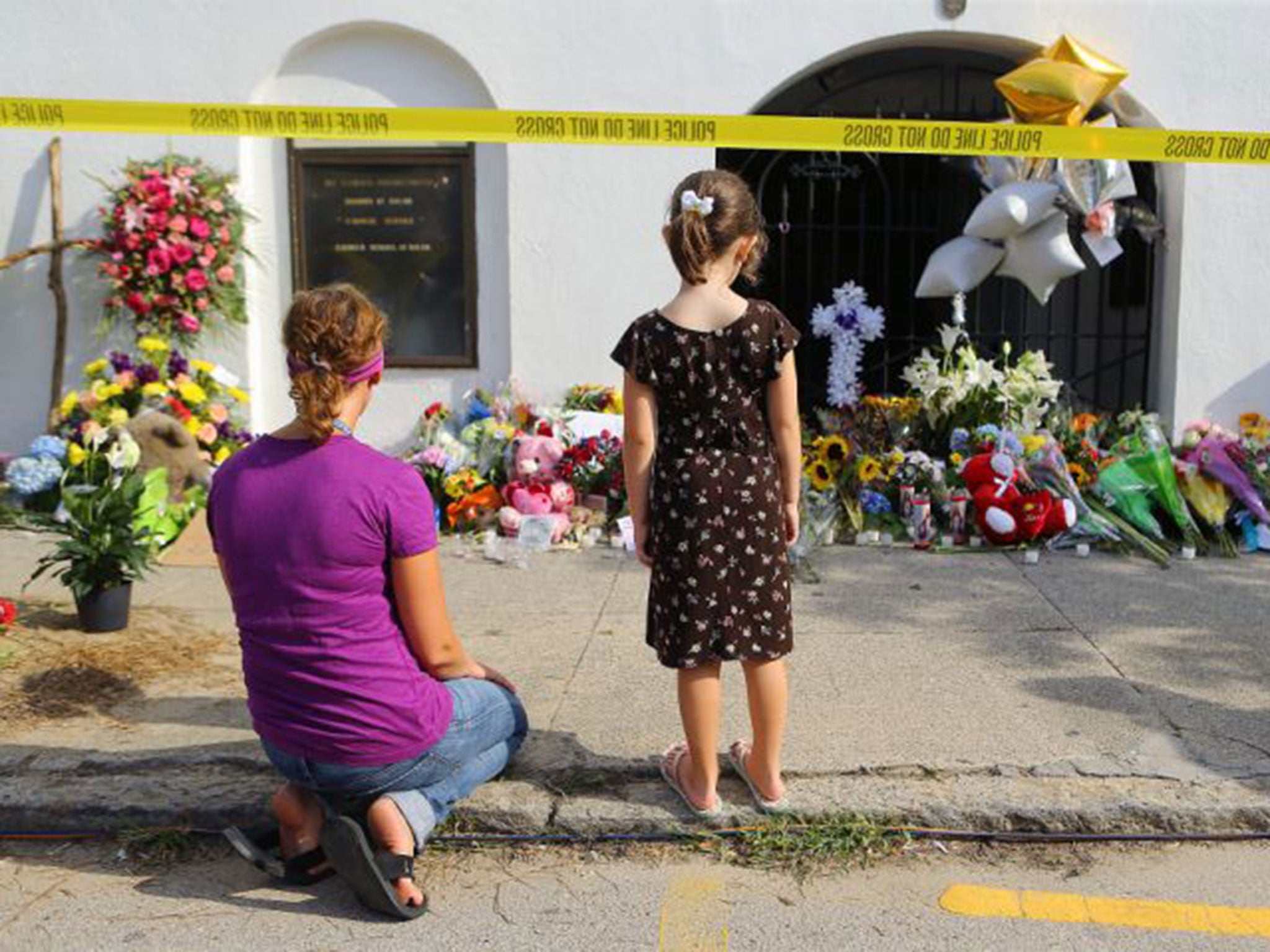 Mourners gather outside of Emauel AME church