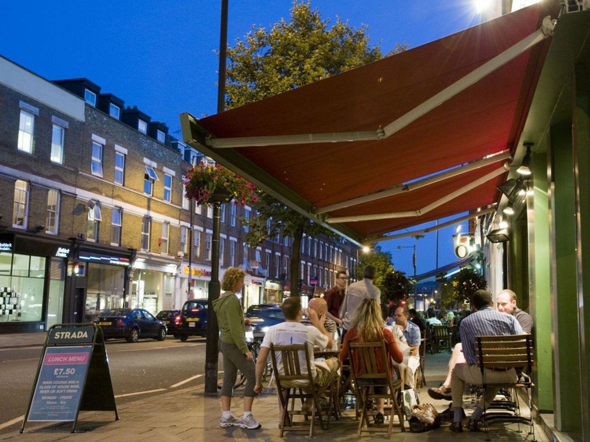 Hot properties: Upper Street in Islington, north London, where a man is suspected of having carried out a rental scam