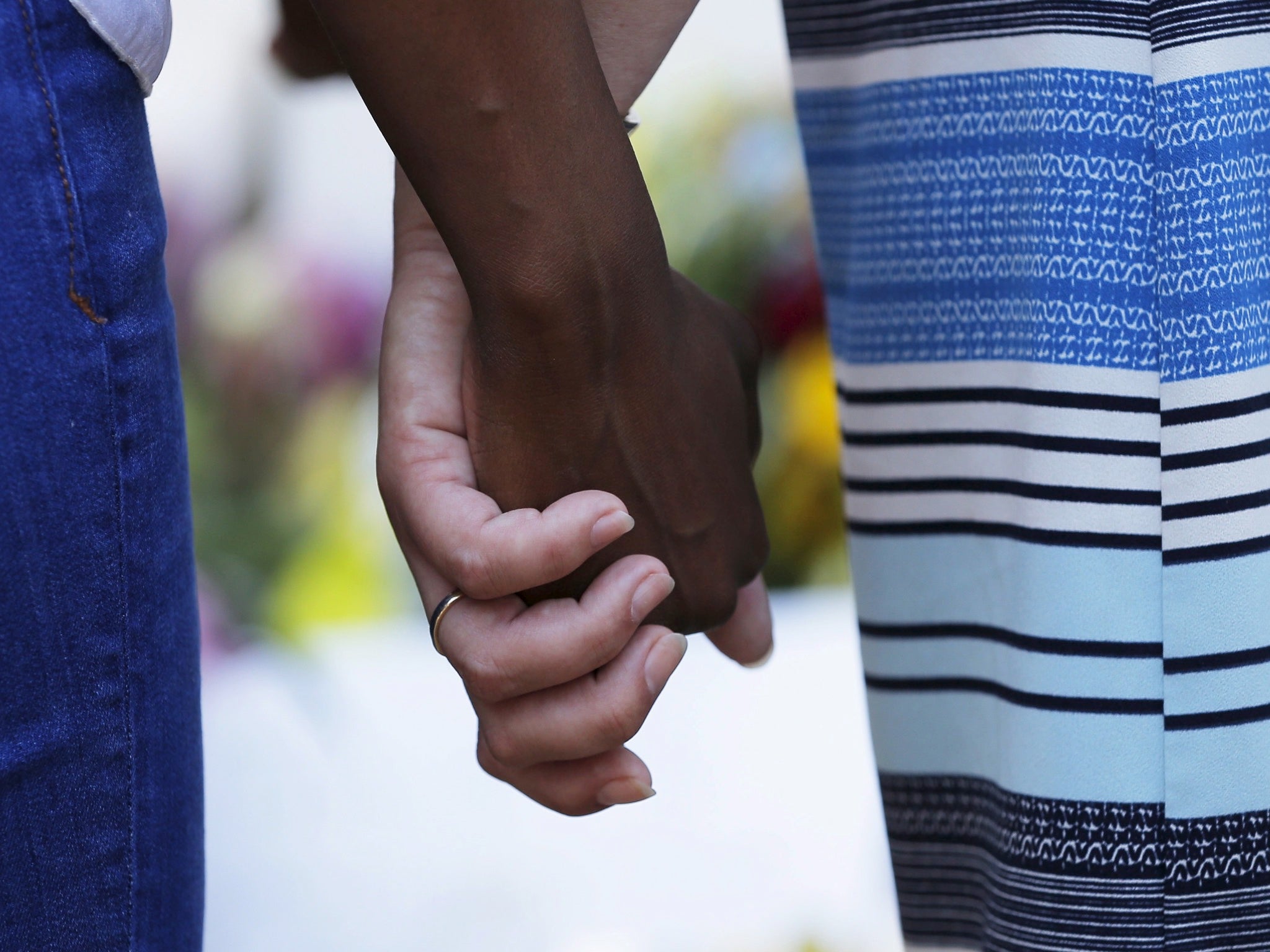 Mourners gathered outside the Emanuel African Methodist Episcopal Church