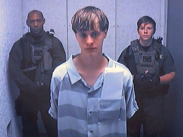 Dylann Roof did not appear to react as he appeared in court via video link