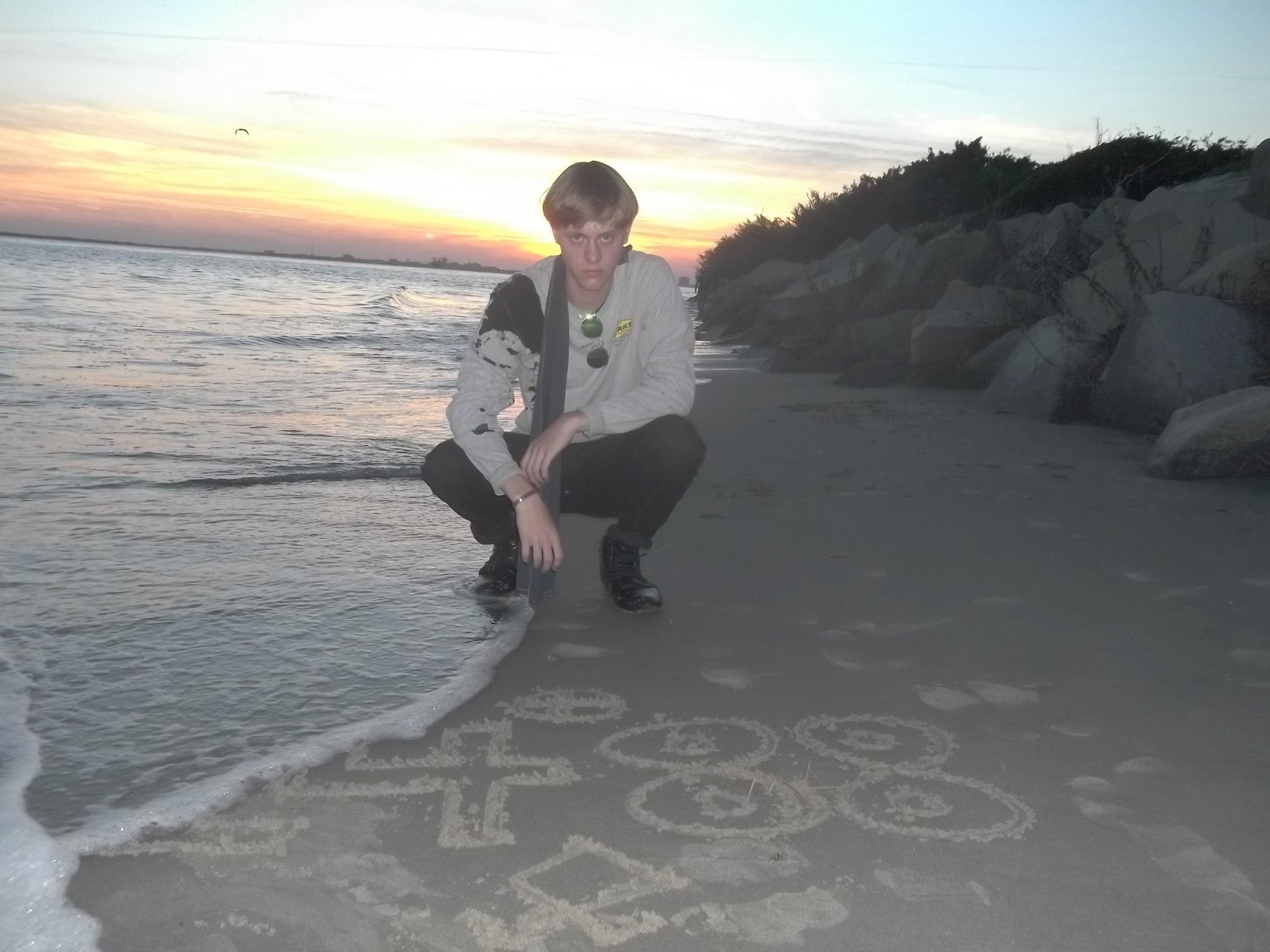 Mr Roof posing next to a 1488 symbol - often associated with neo-Nazi culture