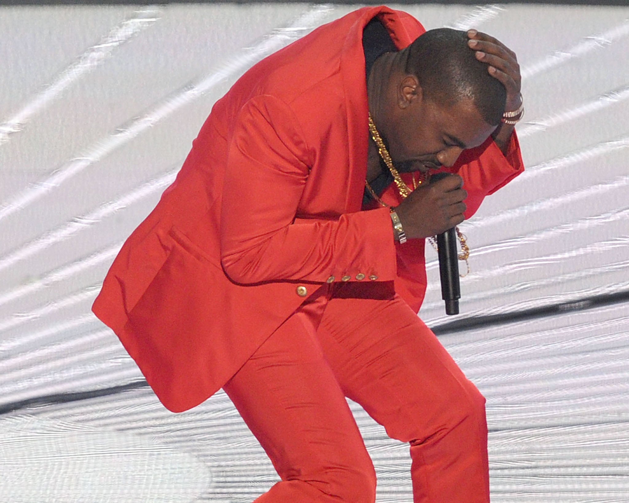 Rapper Kanye West had better invest in some wipe-clean gear for Glastonbury