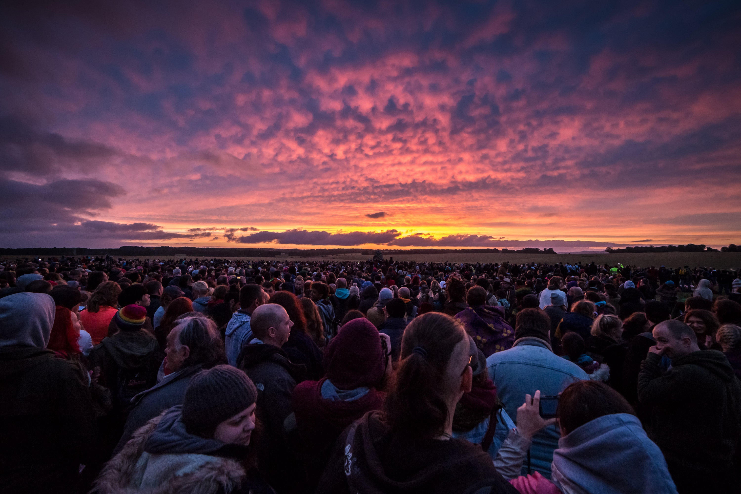 The sun rising over Stonehenge this morning