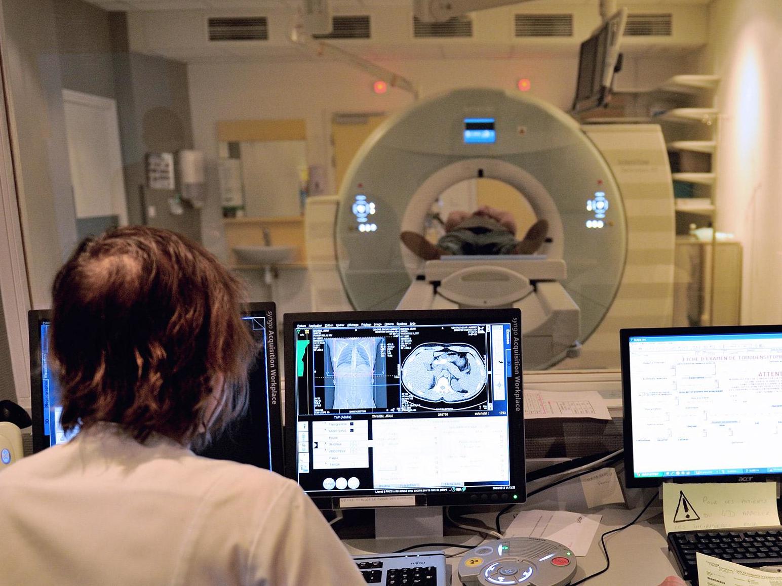 A cancer patient undergoes a CT scan. Around 300,000 new cancer diagnoses are made in the UK every year (Getty)