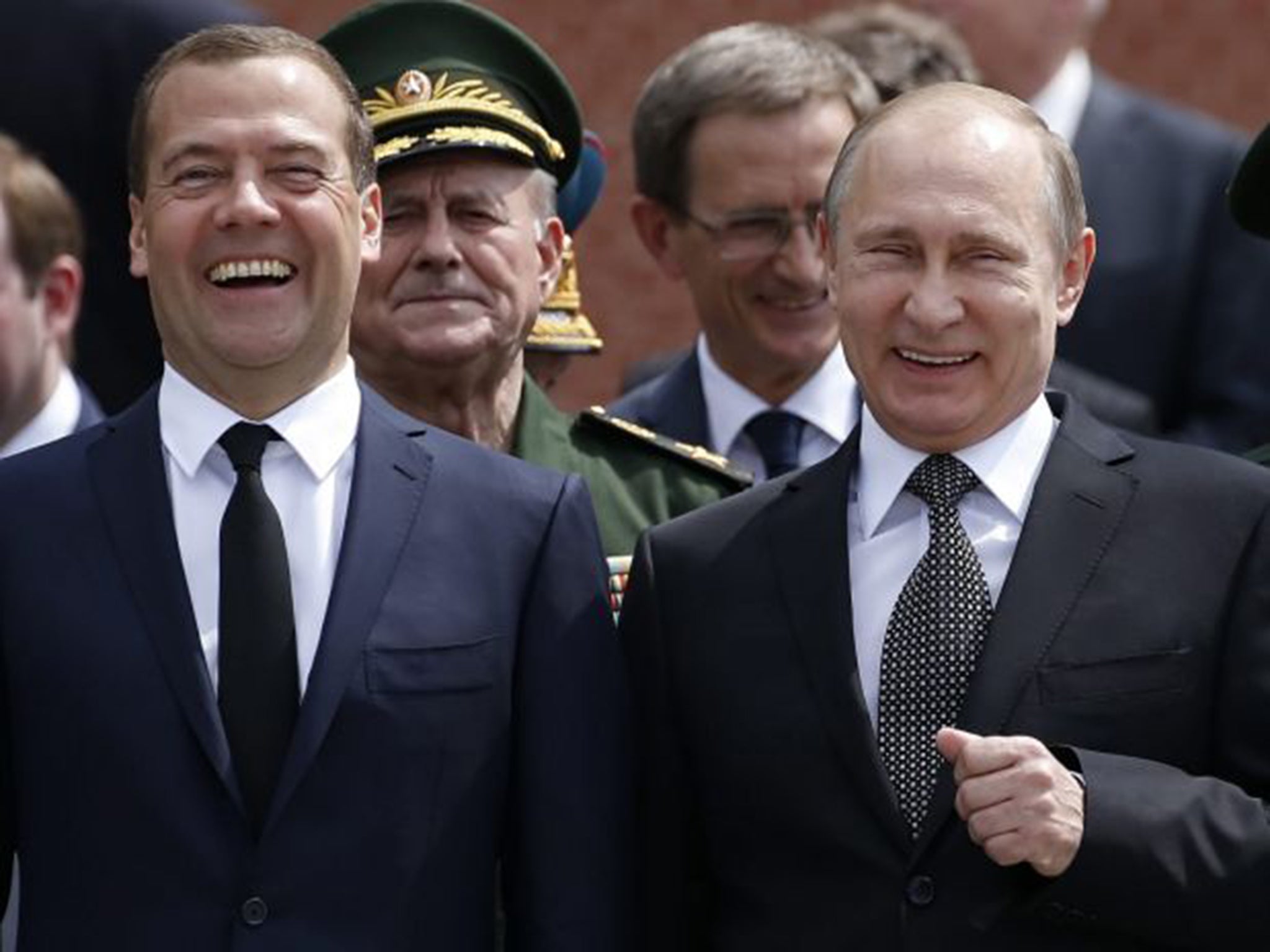 President Putin, right, with Prime Minister Dmitry Medvedev, was accused of ‘nuclear sabre-rattling’