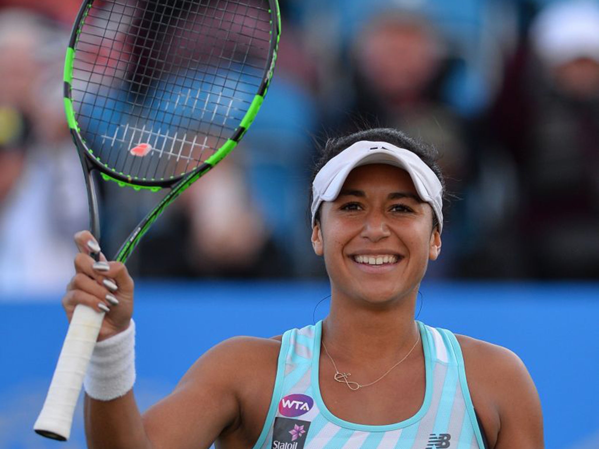 Heather Watson salutes the crowd after her first-round victory