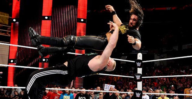 Lesnar lands a German suplex on Rollins