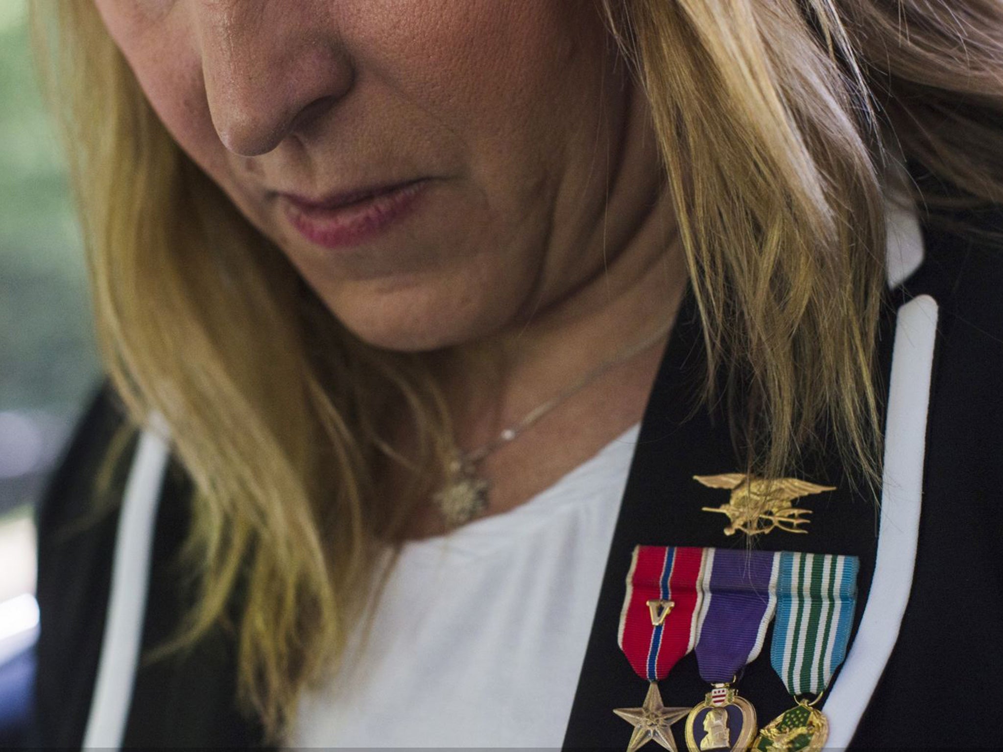 Beck wears her military decorations on the campaign trail