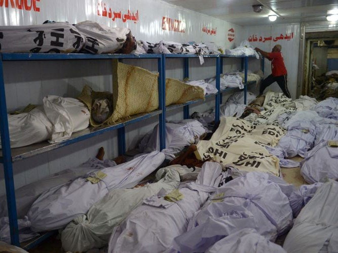 Morgues are overflowing in Karachi after more than 1,000 died in five days