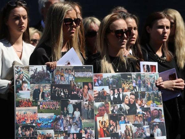 Mourners attend the funeral of Eoghan Culligan at the Church of the Annunciation, in Dublin on Tuesday