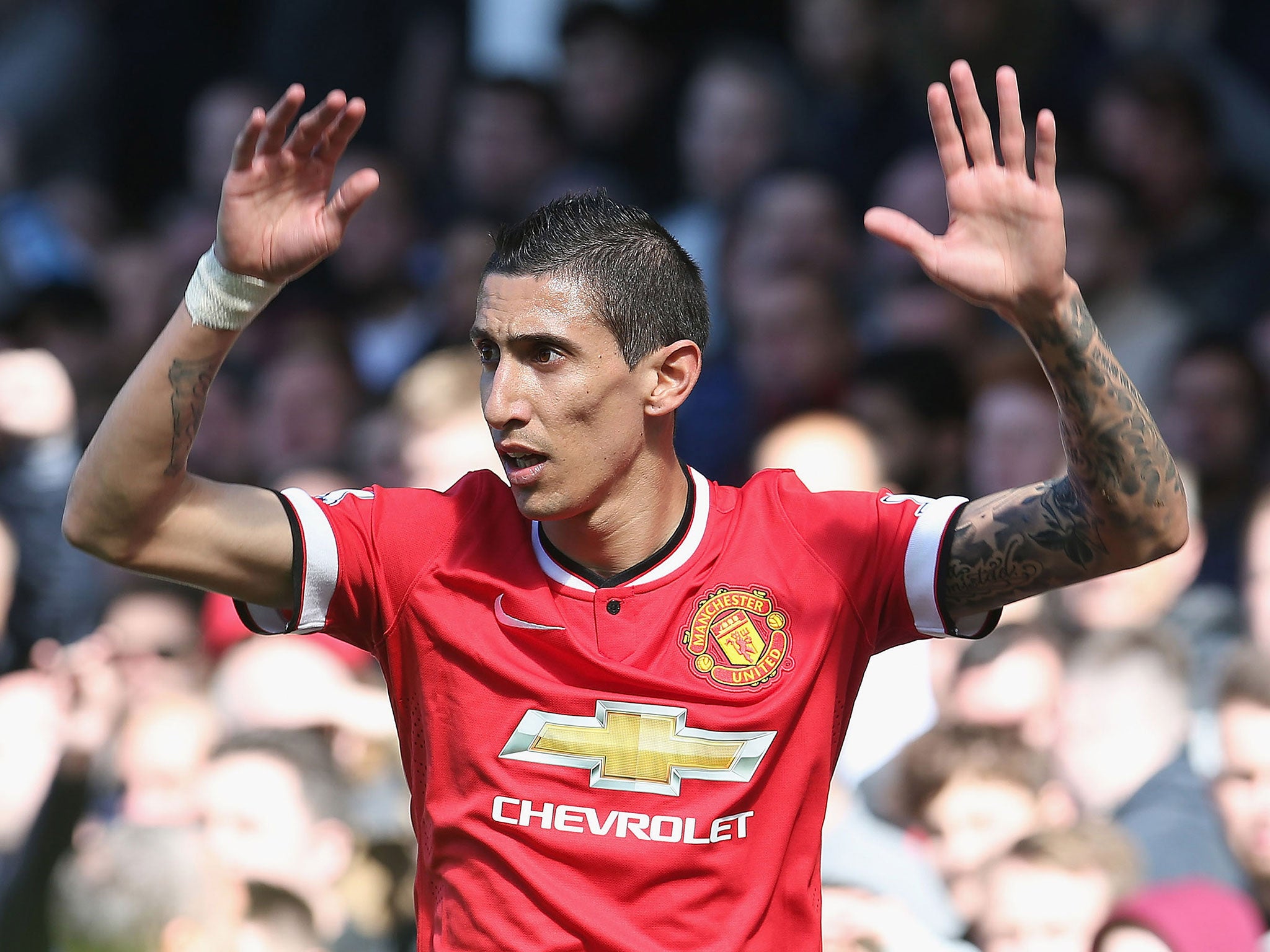 Di Maria gestures during a game for United