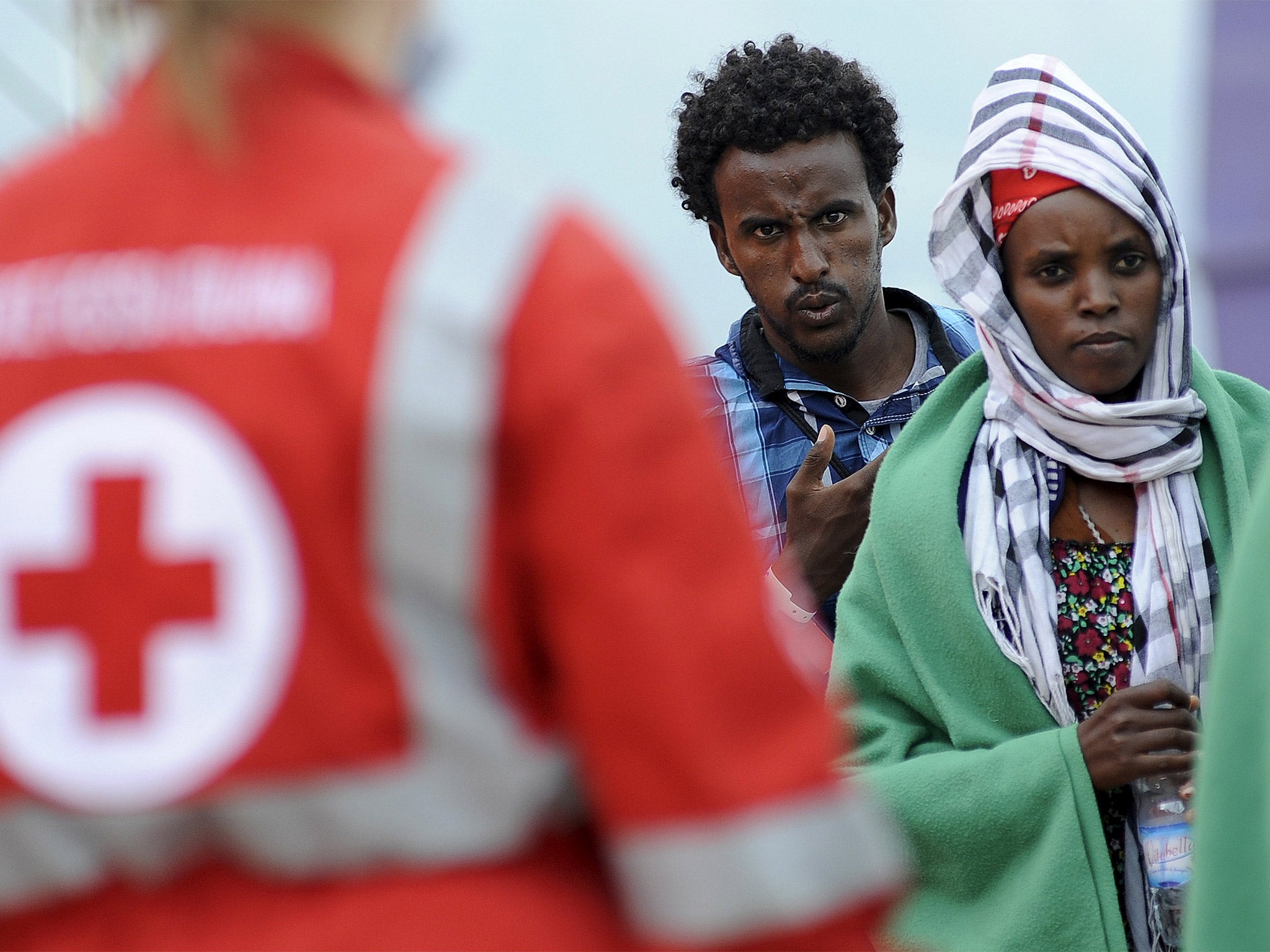 About 770 migrants arrive in Palermo, Italy on Wednesday after being rescued by a Norwegian military ship